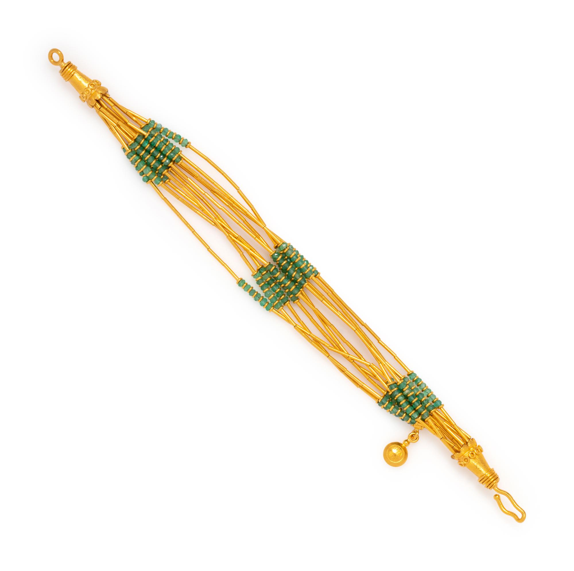 HIGH KARAT GOLD AND EMERALD BEAD BRACELET