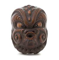 A Japanese Boxwood Netsuke Length 3 1/4 inches.