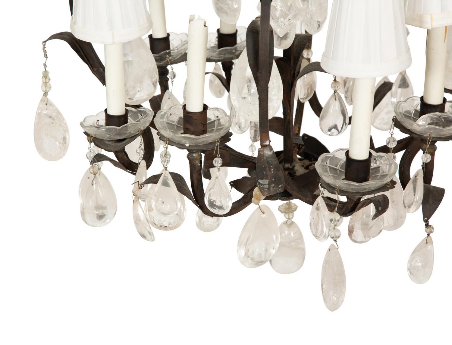A Wrought Iron and Rock Crystal Eight-Light Chandelier