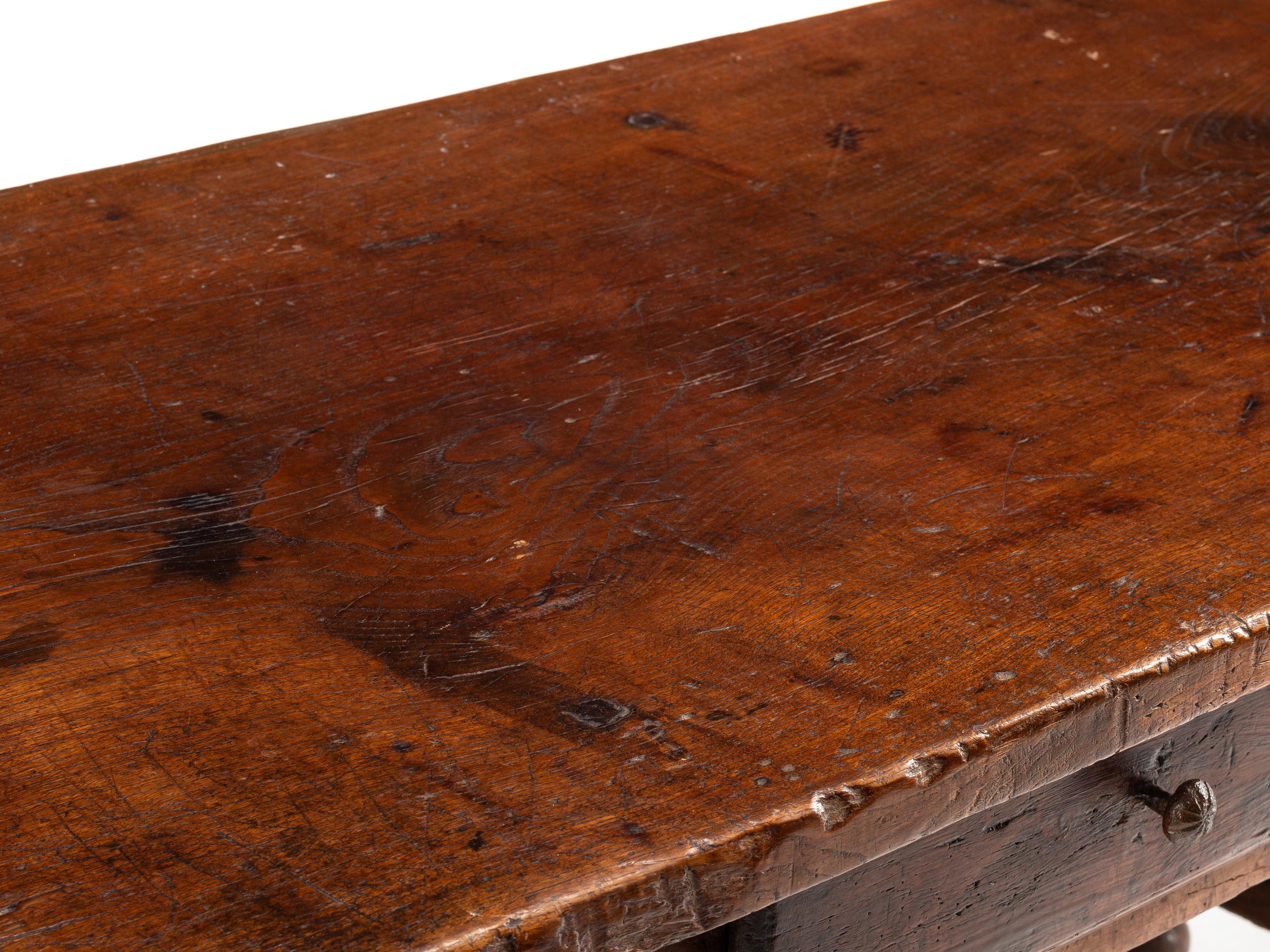 An Italian Baroque Walnut Table