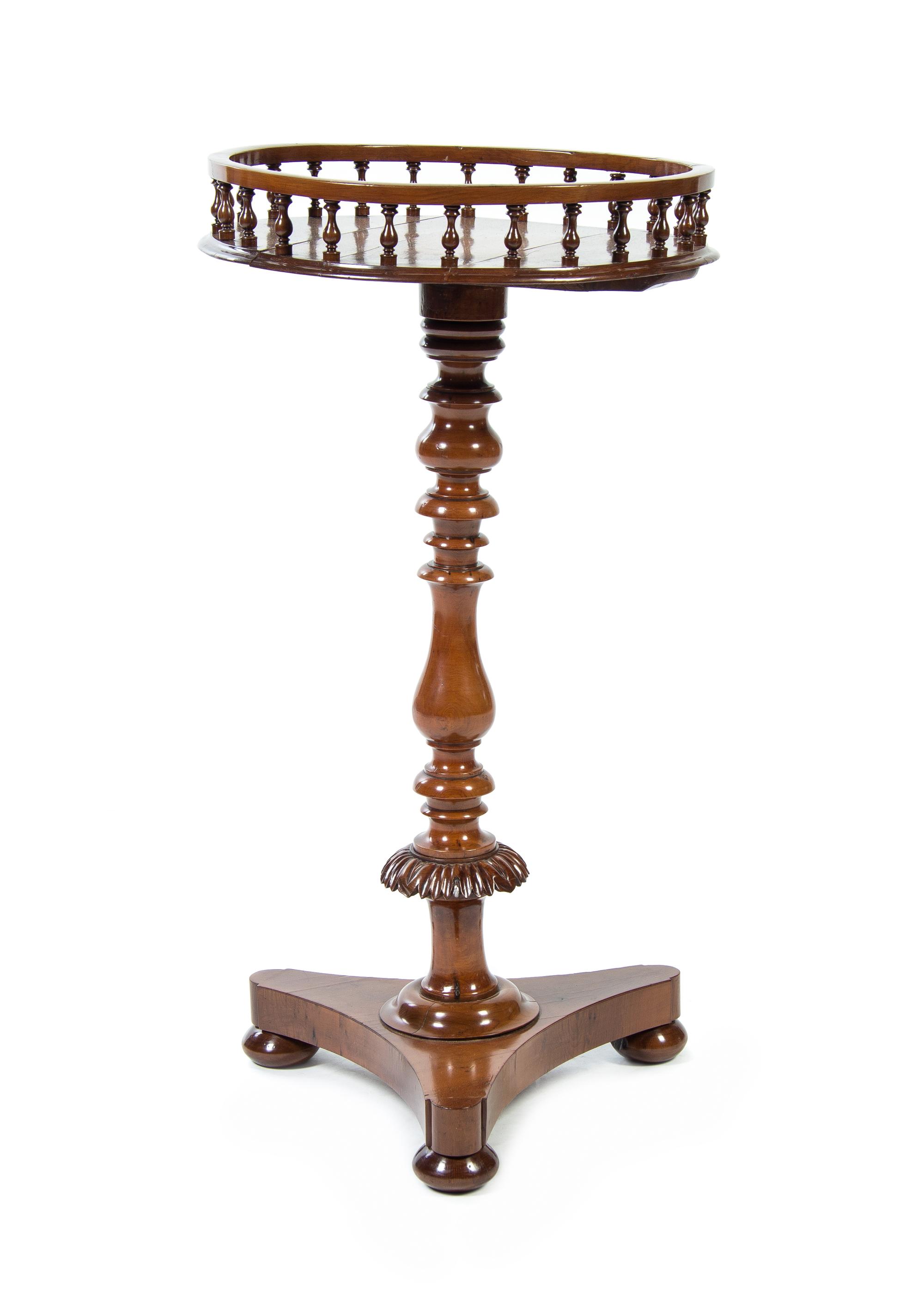 An Irish Yew Wood Candle Stand, LATE 18TH/EARLY 19TH CENTURY, Height 31 x diameter of top 15 1/2 inches. — LATE 18TH/EARLY 19TH CENTURY,