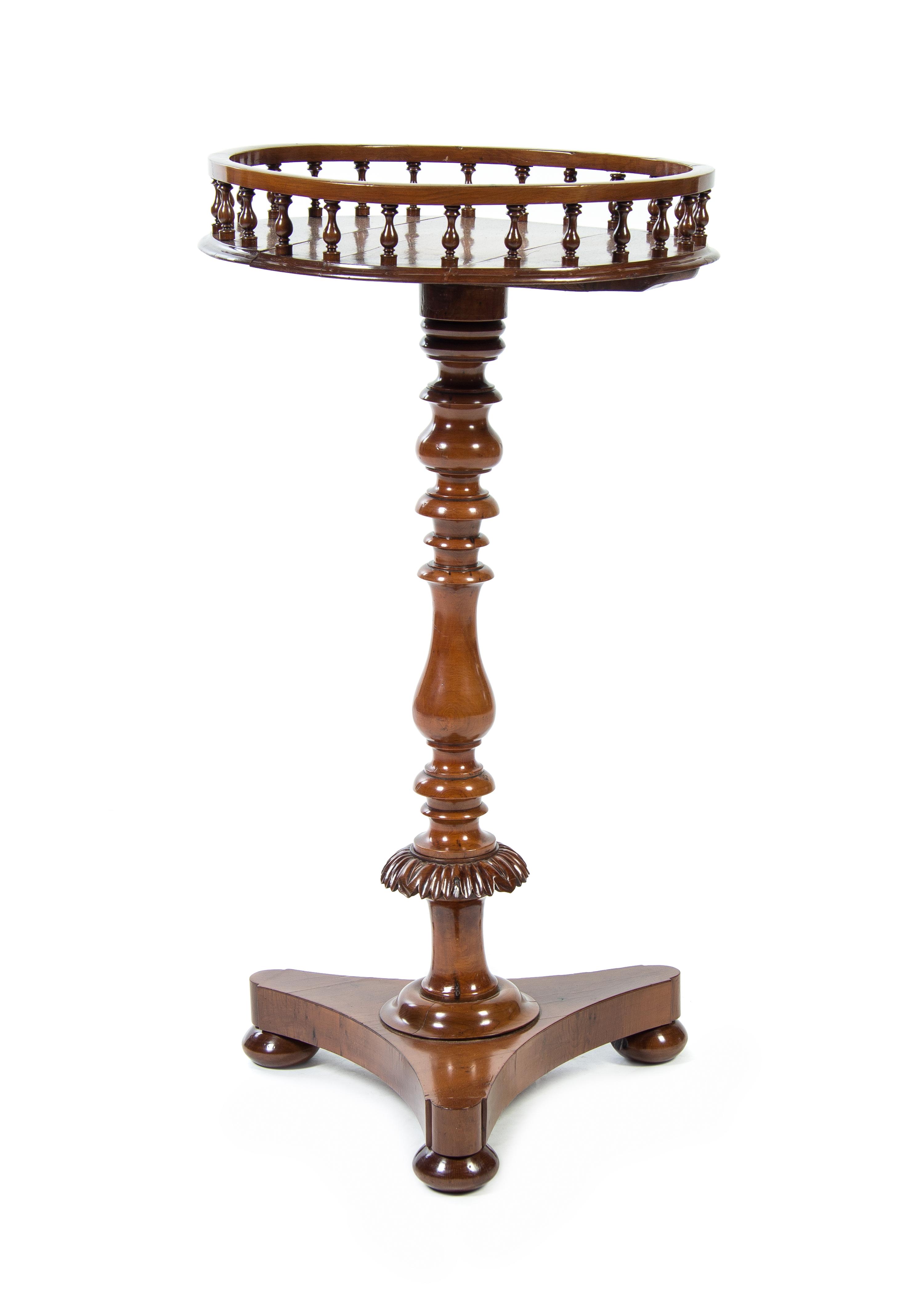 An Irish Yew Wood Candle Stand, LATE 18TH/EARLY 19TH CENTURY, Height 31 x diameter of top 15 1/2 inches. — LATE 18TH/EARLY 19TH CENTURY,