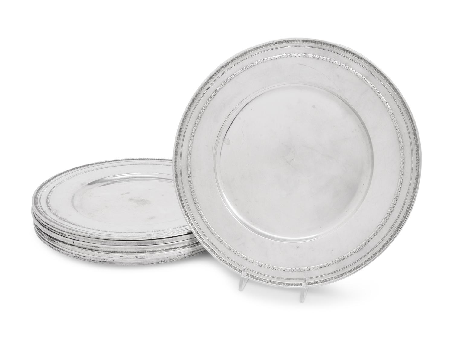 A Set of Eight American Silver Chargers