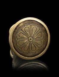 A Small Tibetan Bronze Pala-Style Model of a Stupa