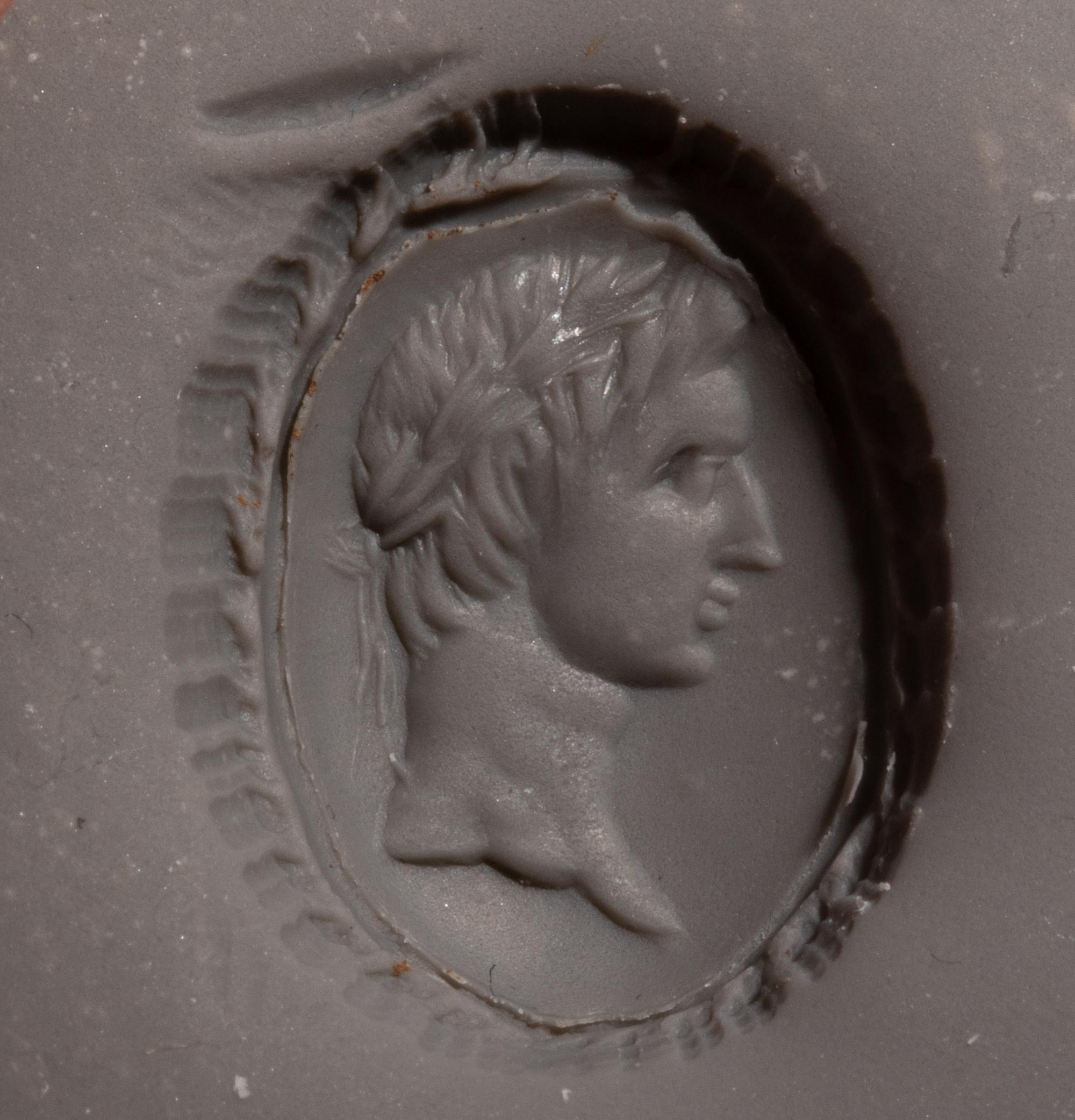 A Roman Red Jasper Ring Stone with a Portrait Head of a Roman Emperor — Set in a Victorian gold ring