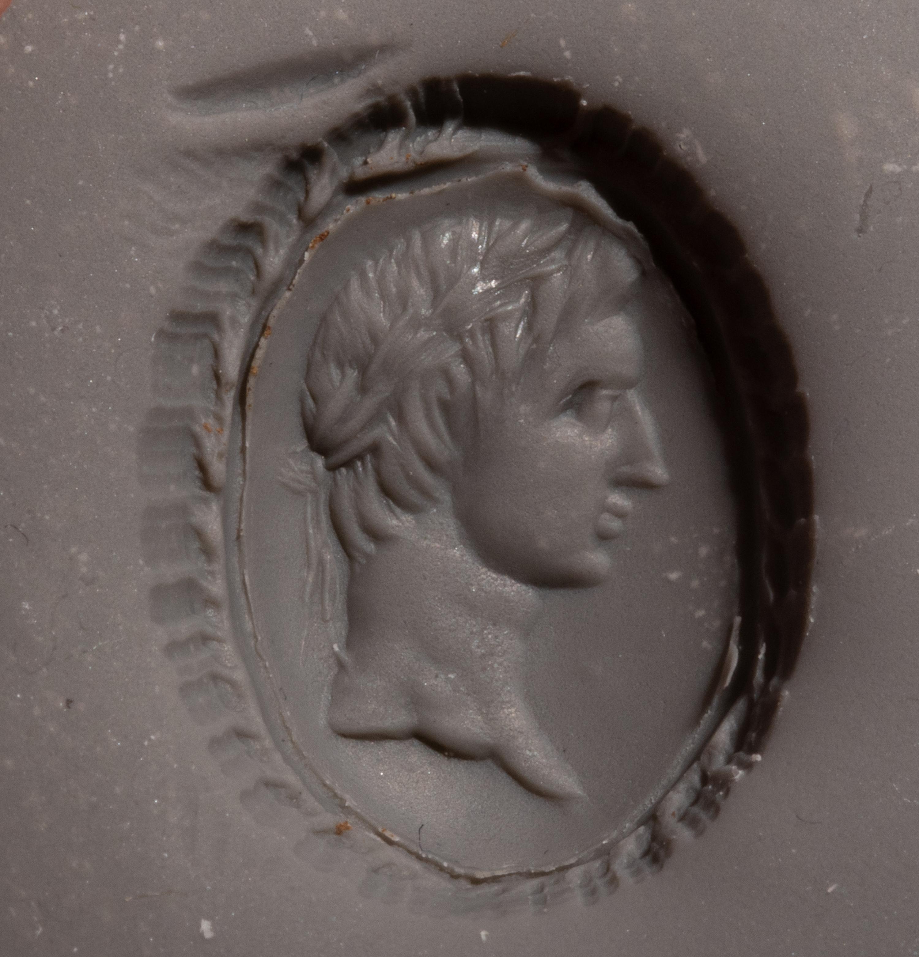 A Roman Red Jasper Ring Stone with a Portrait Head of a Roman Emperor — Set in a Victorian gold ring