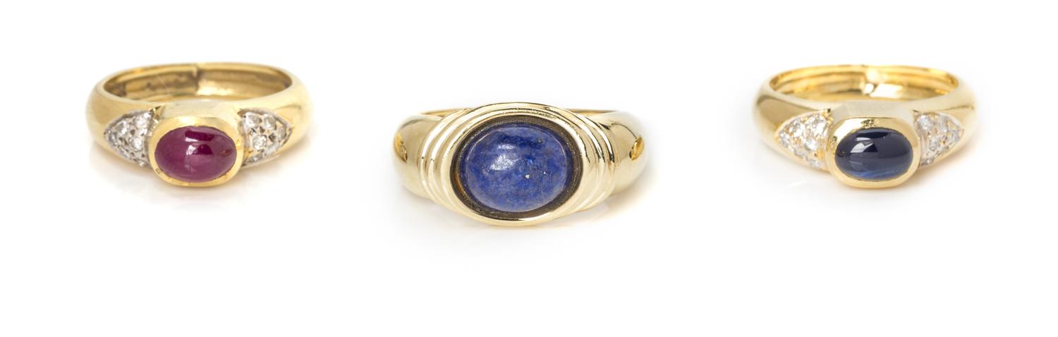 A Collection of 18 Karat Yellow Gold Gemstone Rings, 11.00 dwts.