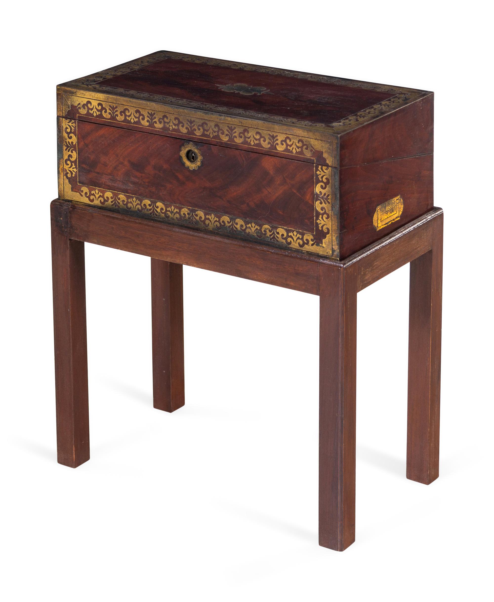 A Regency Brass Inlaid Mahogany Writing Box on a Later Stand