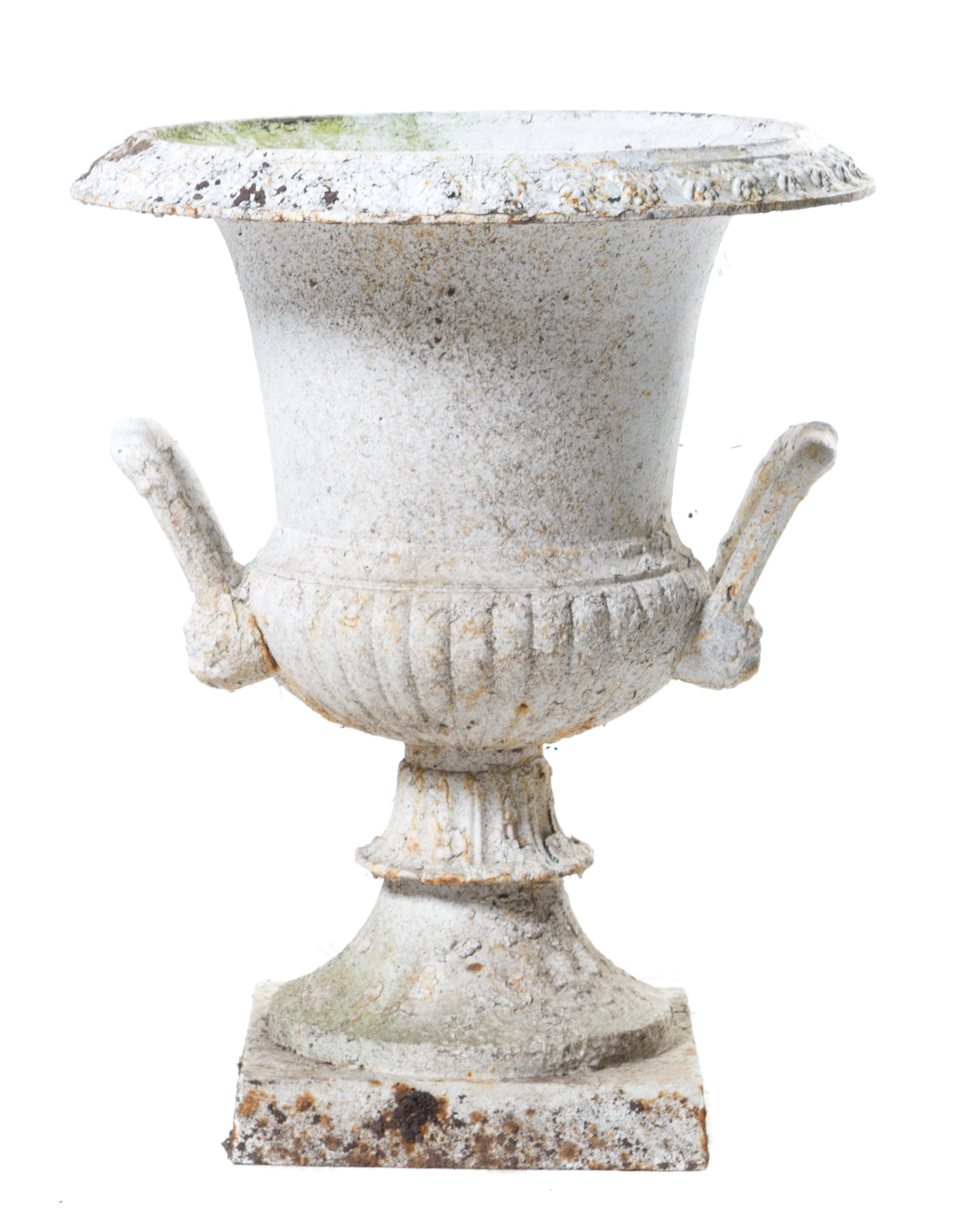 A Victorian Painted Iron Garden Urn Height 25 inches.