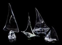A Group of Four Glass Sailboats