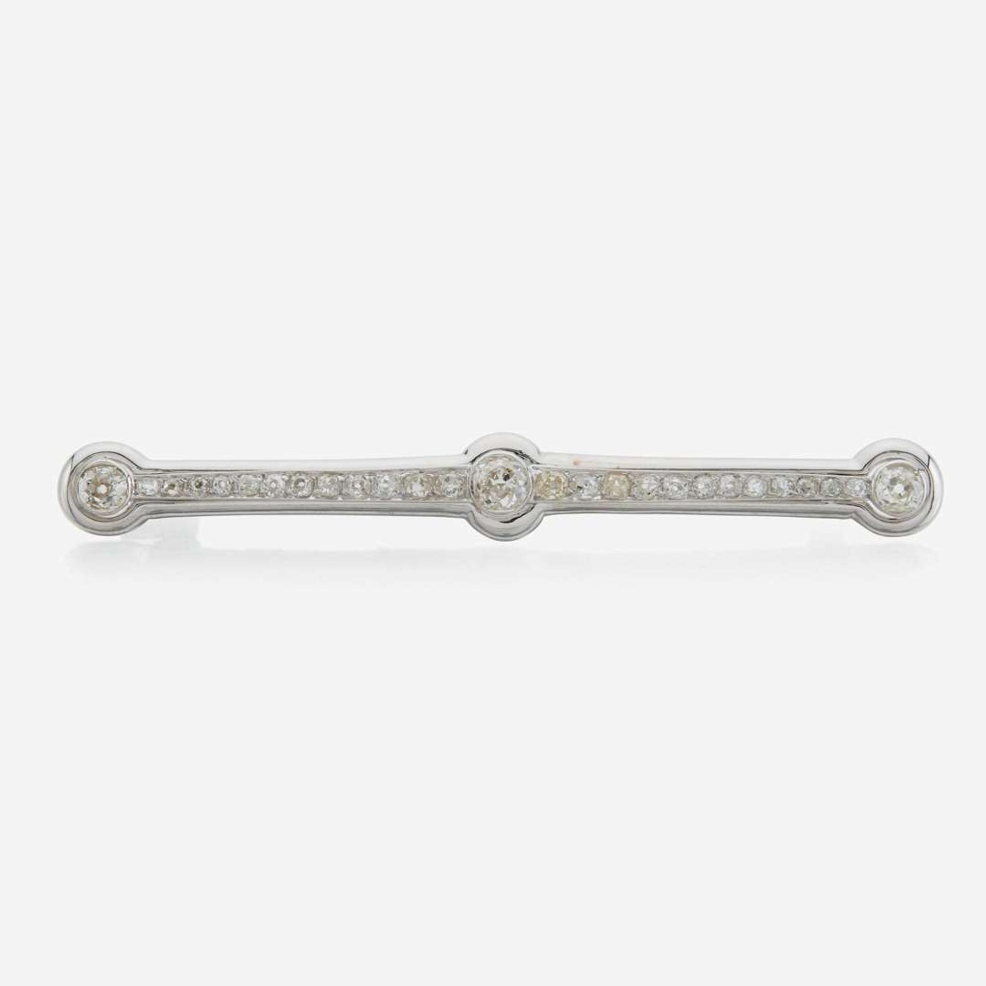 A diamond and white gold brooch
