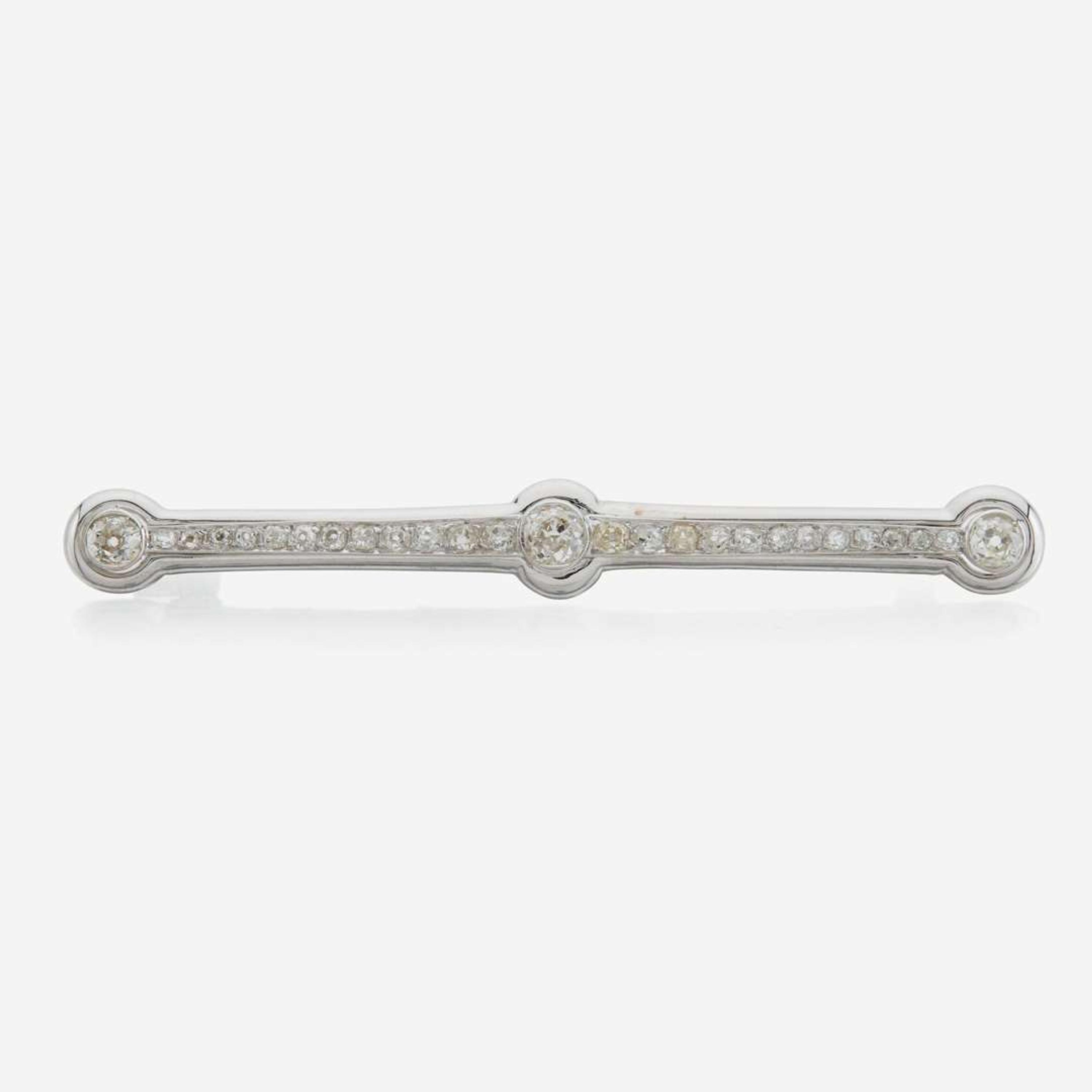 A diamond and white gold brooch