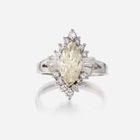 A diamond and eighteen karat white gold ring