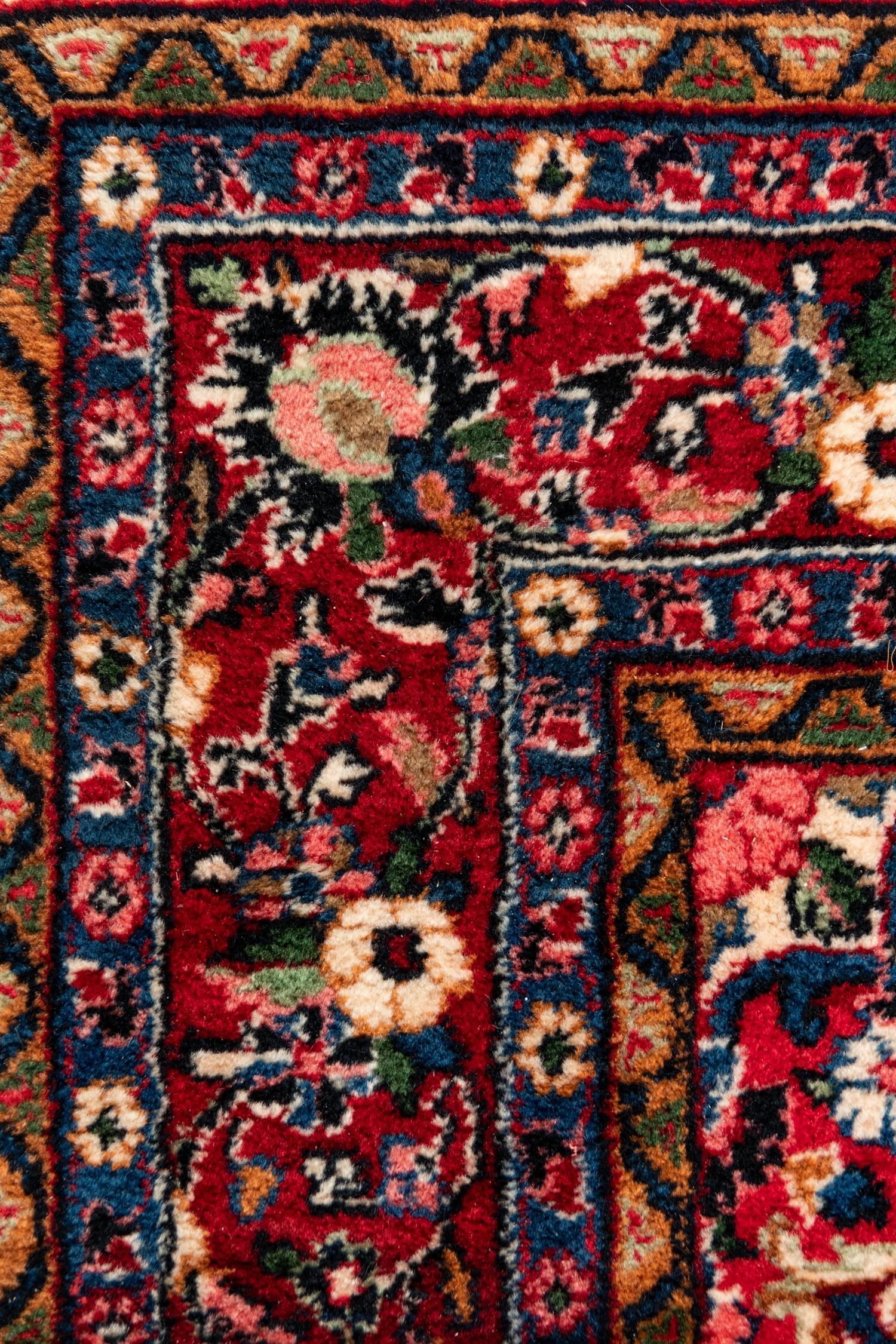 A Kirman Wool Rug