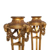 A Pair of George III Style Giltwood Torchères
