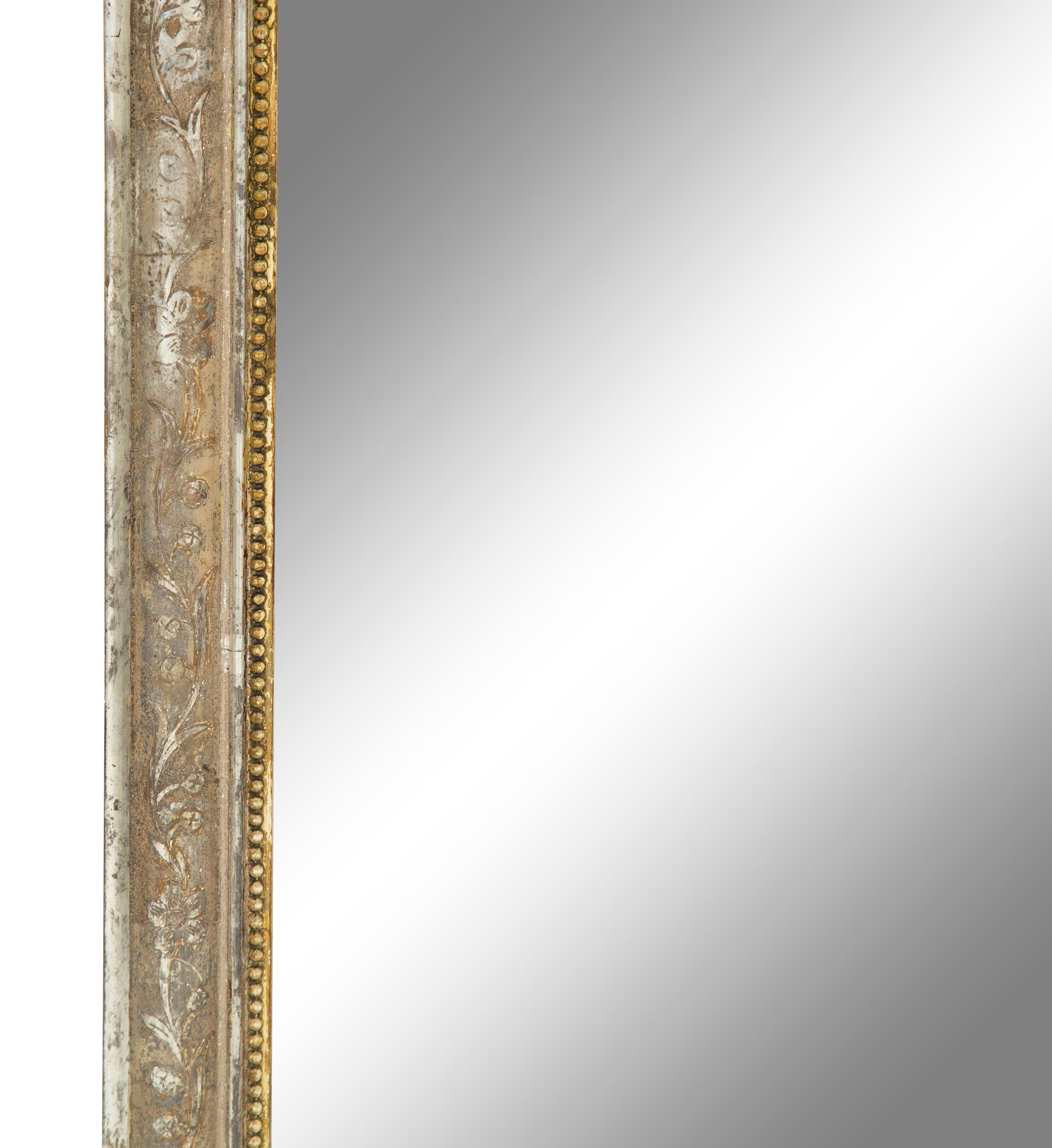 A Napoleon III Silvered and Gilt Wood Mirror