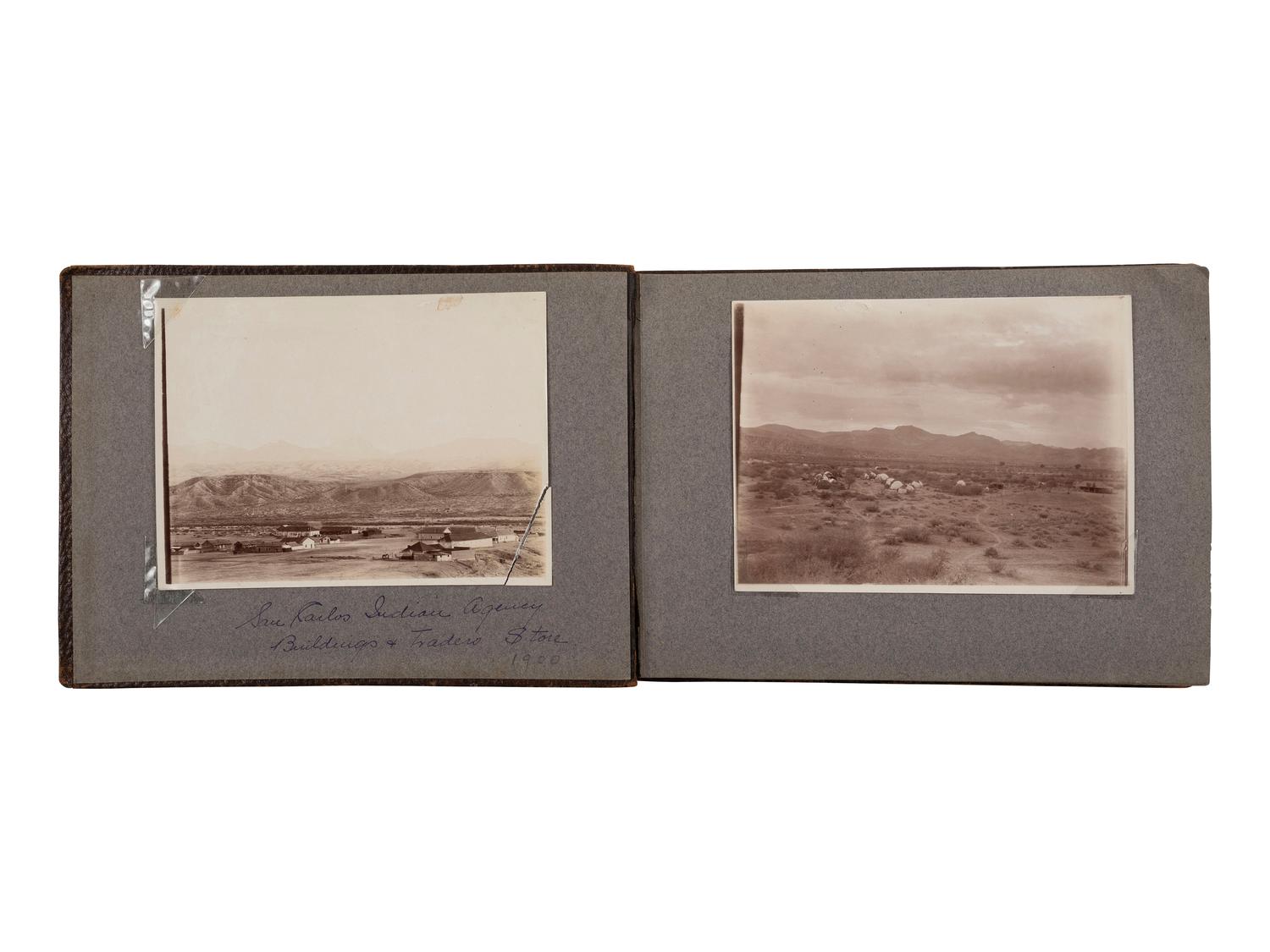 [NATIVE AMERICANS]. JONES, John Edward (1863-1922), photographer. Album containing 50 photographs of the San Carlos Indian Agency, including Apache civilians and police, agency buildings and dwellings, and scenic views. Ca 1904.