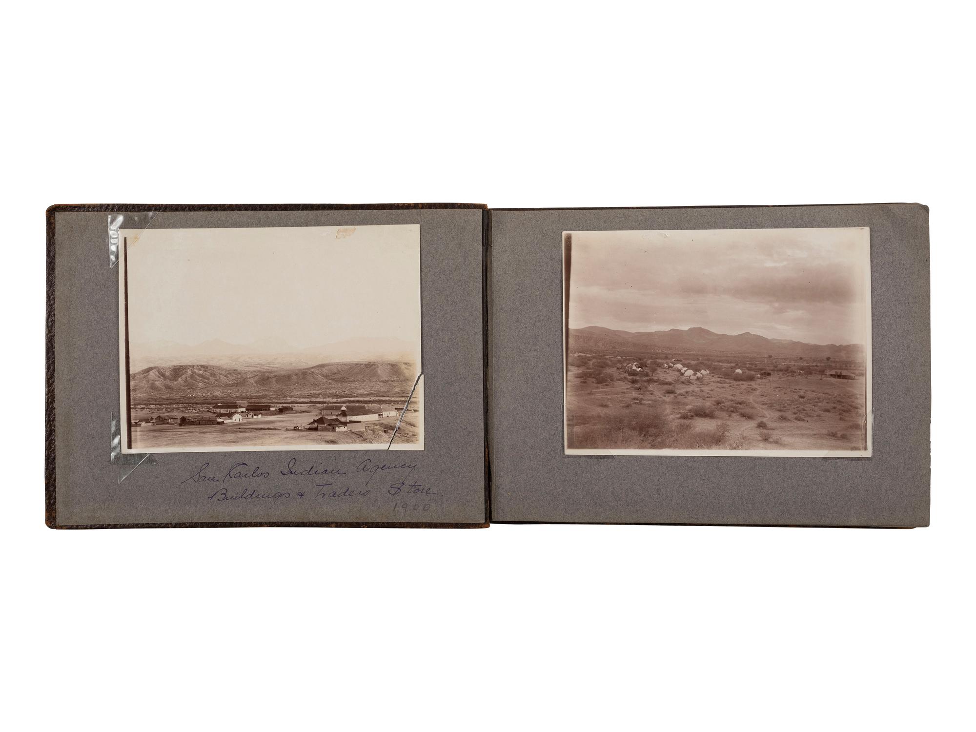 [NATIVE AMERICANS]. JONES, John Edward (1863-1922), photographer. Album containing 50 photographs of the San Carlos Indian Agency, including Apache civilians and police, agency buildings and dwellings, and scenic views. Ca 1904.