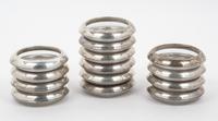 A Set of Fourteen American Silver Mounted Glass Coasters Diameter 3 7/8 inches. — Frank M. Whiting