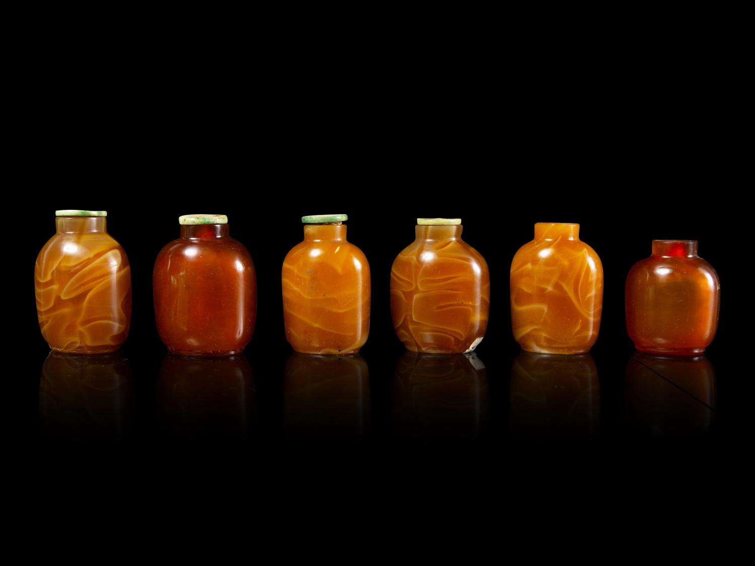 Six Chinese Russet Glass Snuff Bottles
