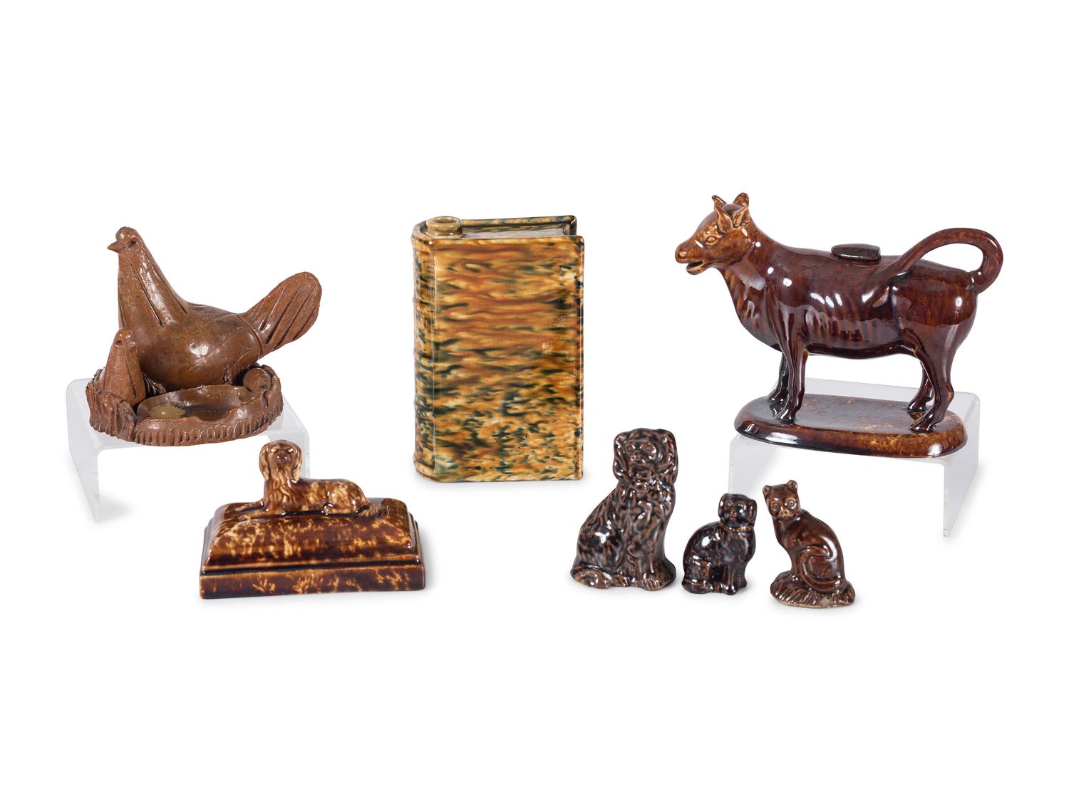 Seven Figural Bennington Style and Redware Articles