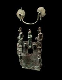 Two Etruscan Bronze Fragments from a Cista