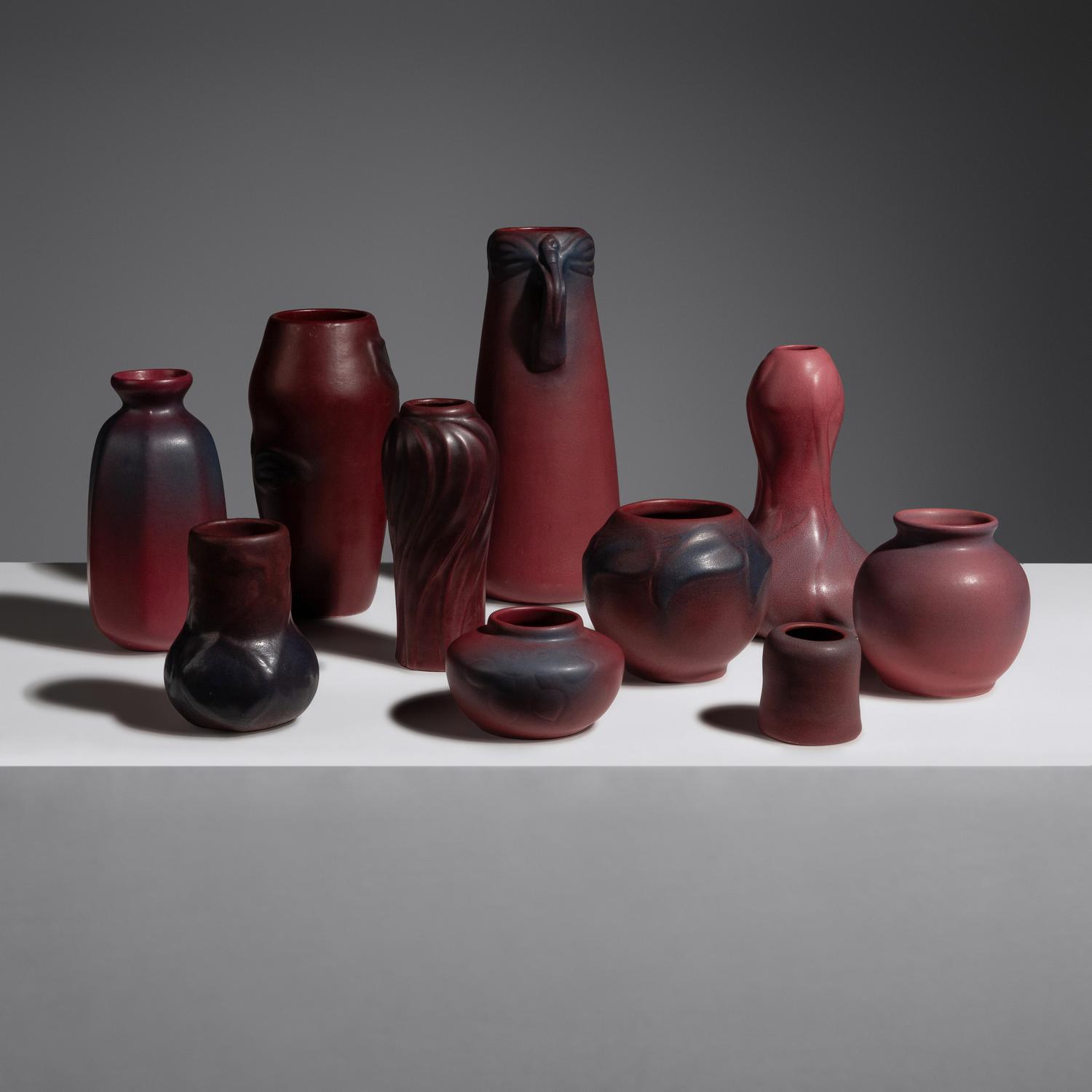 Group of Ten Mulberry Red Pottery Vases