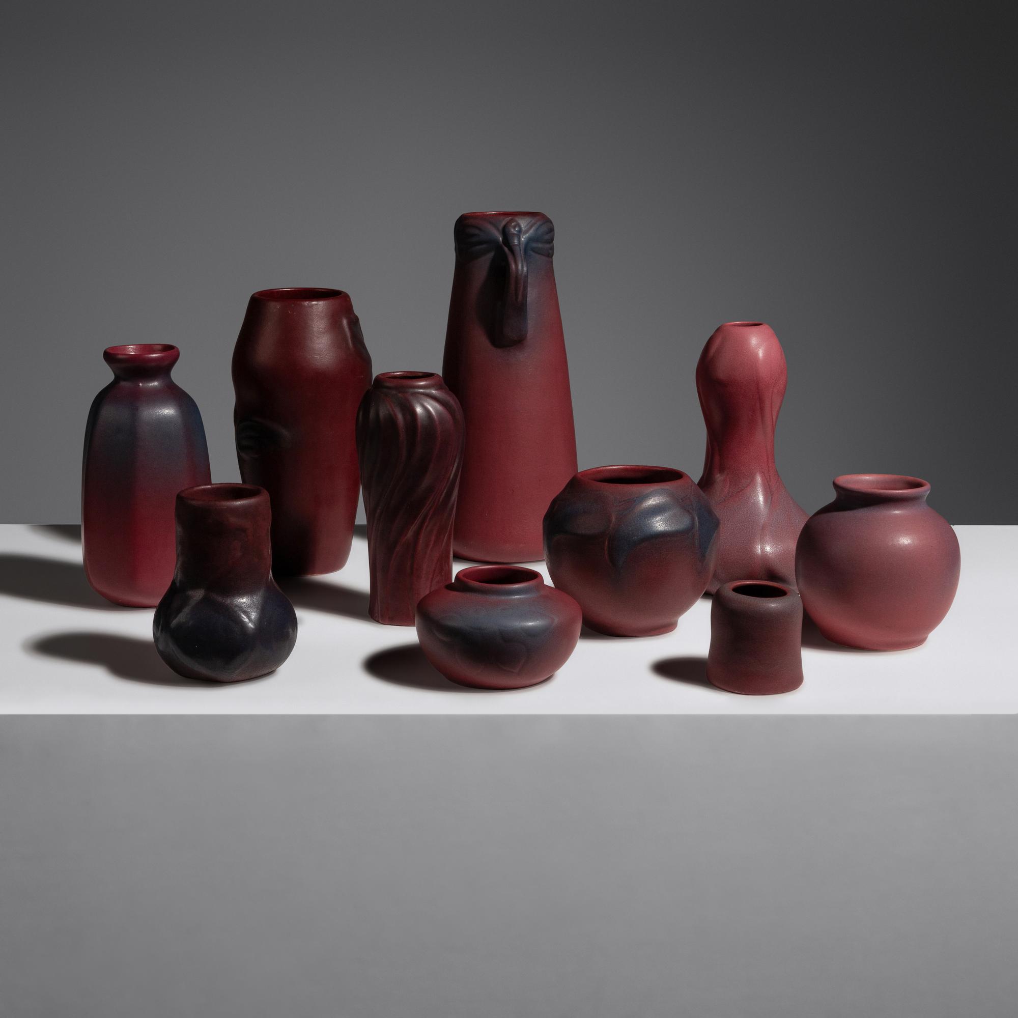 Group of Ten Mulberry Red Pottery Vases