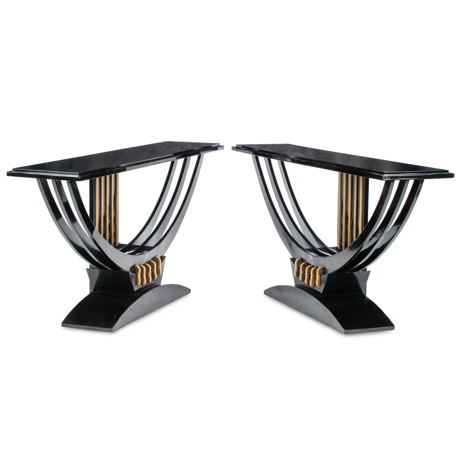 A Pair of Art Deco Style Black Lacquered and Parcel Gilt Console Tables