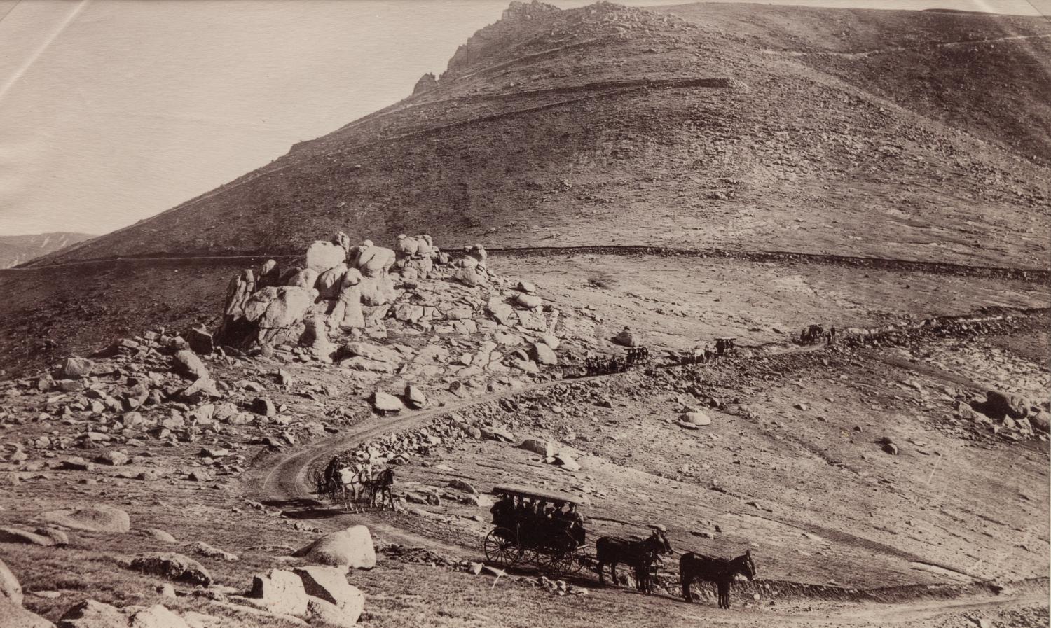 A group of five photographs (854. The Loop; 699. A Glimpse of Pikes Peak. Briarhurst; 1007. Marshall Pass; 3232. Summit of Fremont Pass, 11540 ft.; Untitled (Crossing over a pass))
