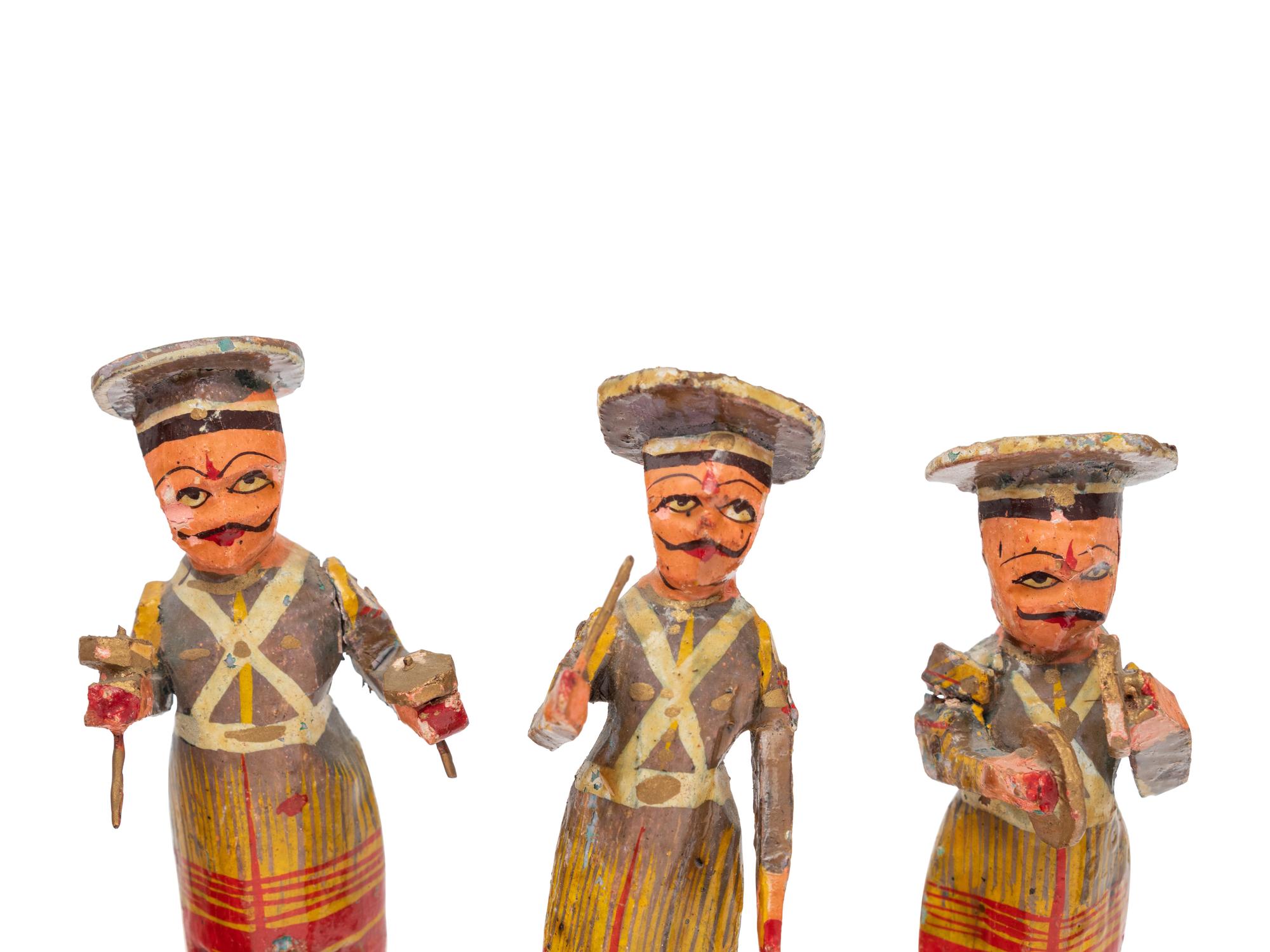 Eight Russian Polychromed Carved Wood Marchind Band Figures