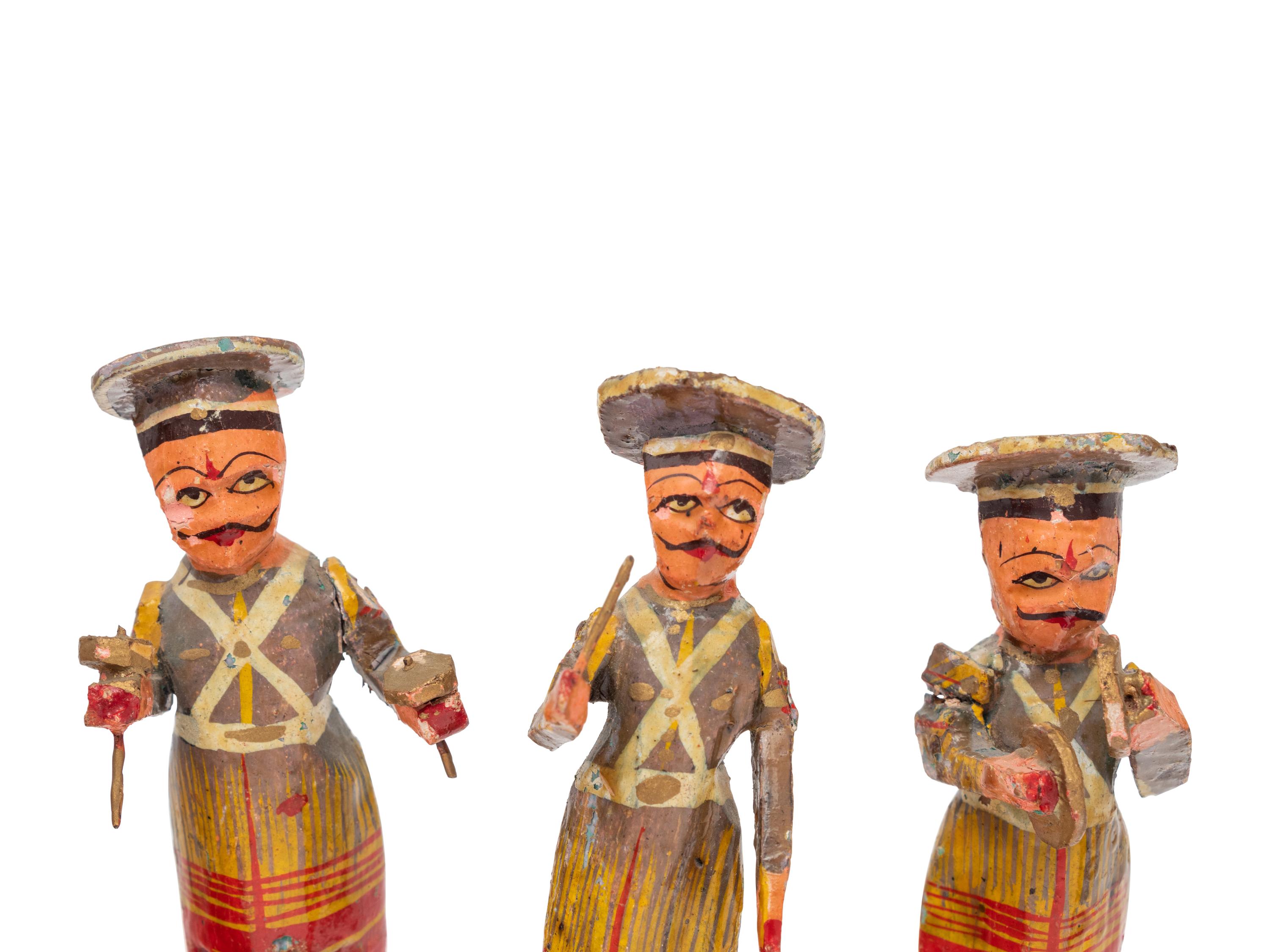 Eight Russian Polychromed Carved Wood Marchind Band Figures