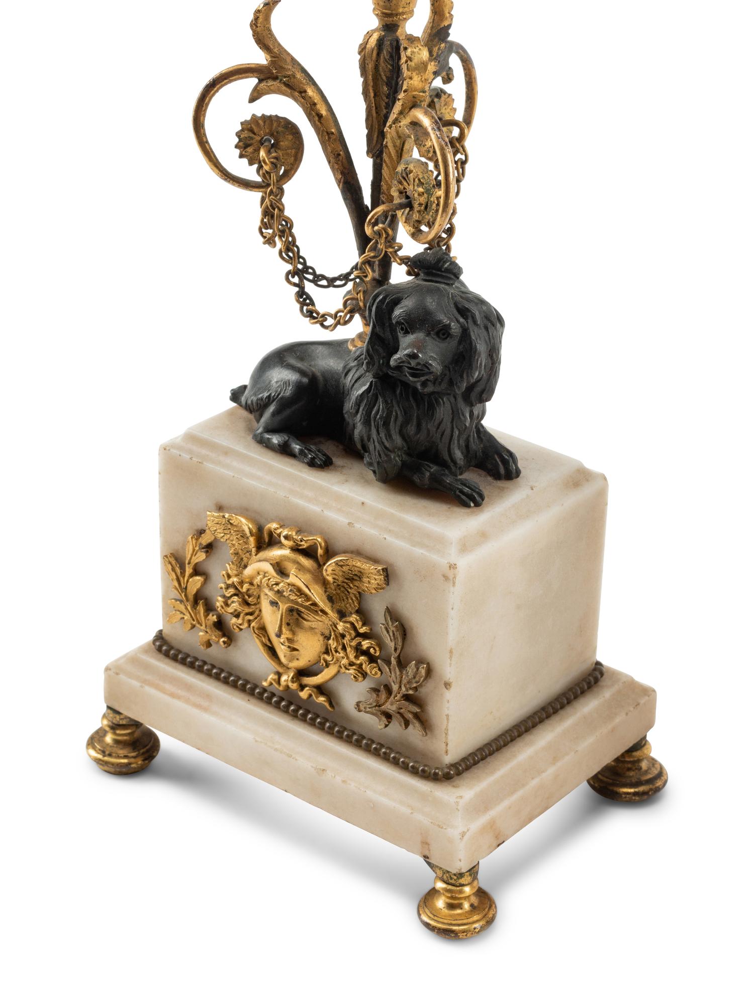 A Pair of Louis Philippe Bronze and Marble Candlesticks