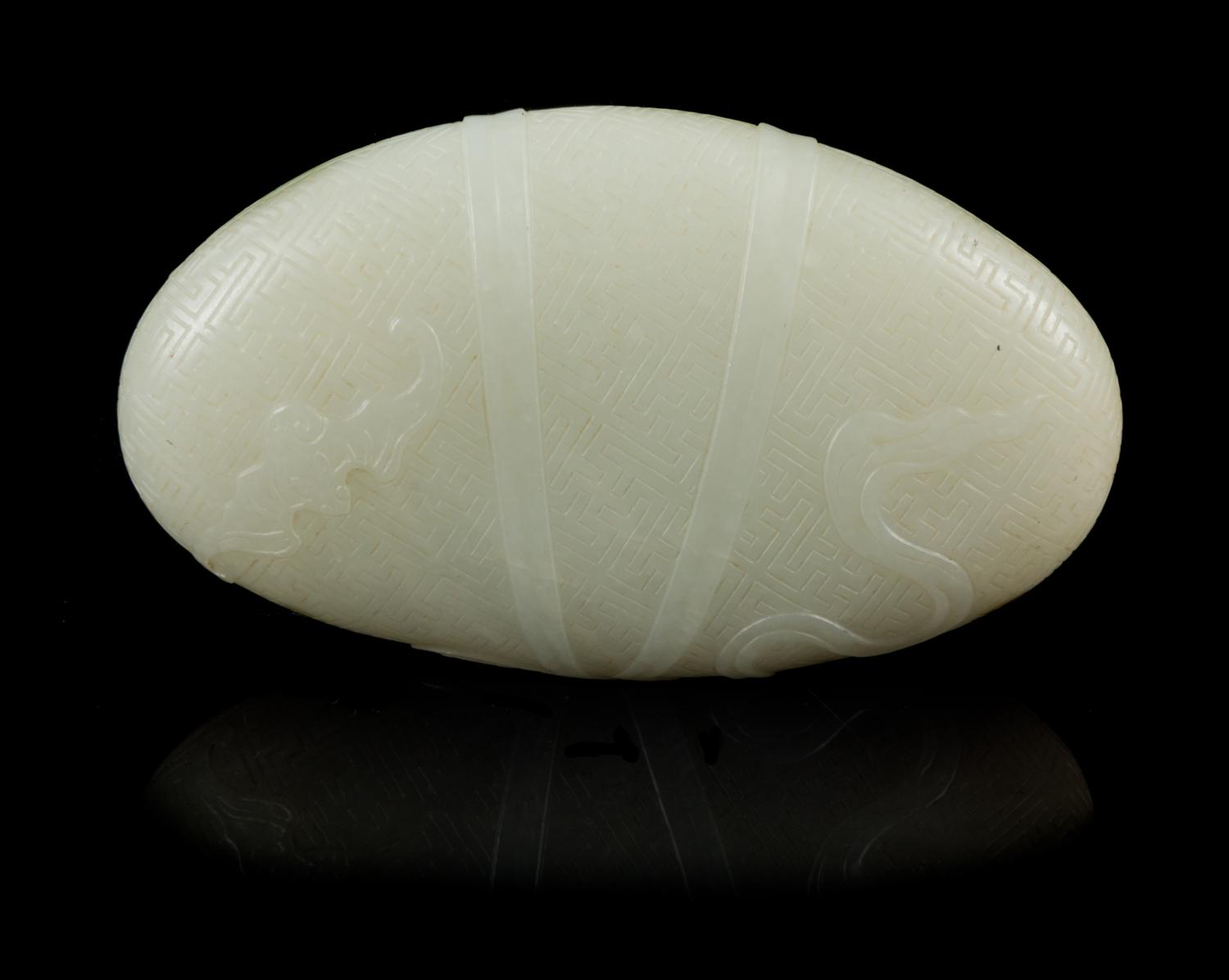 A Pale Celadon Jade Pebble Length 3 3/4 inches. — 18TH/19TH CENTURY