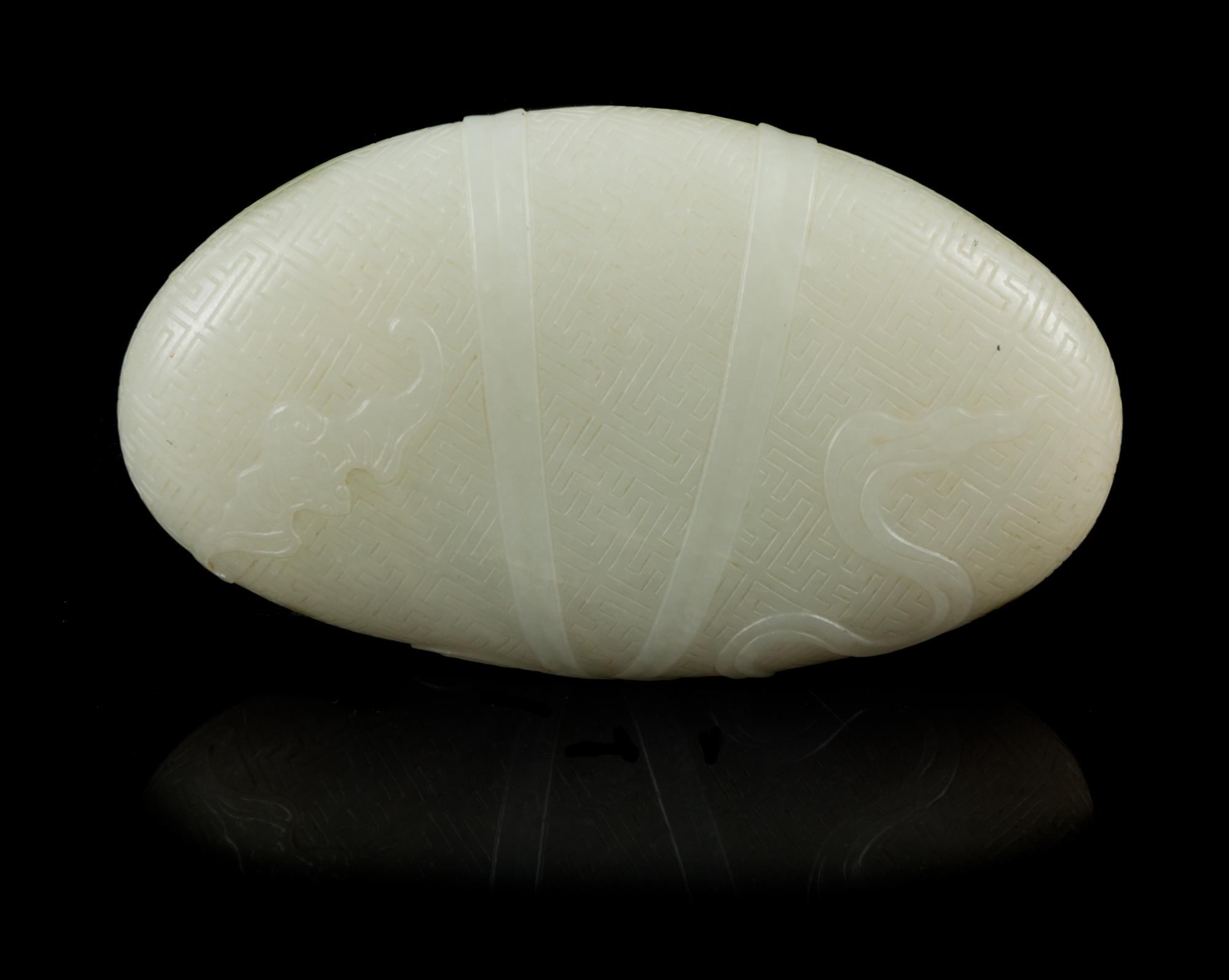 A Pale Celadon Jade Pebble Length 3 3/4 inches. — 18TH/19TH CENTURY