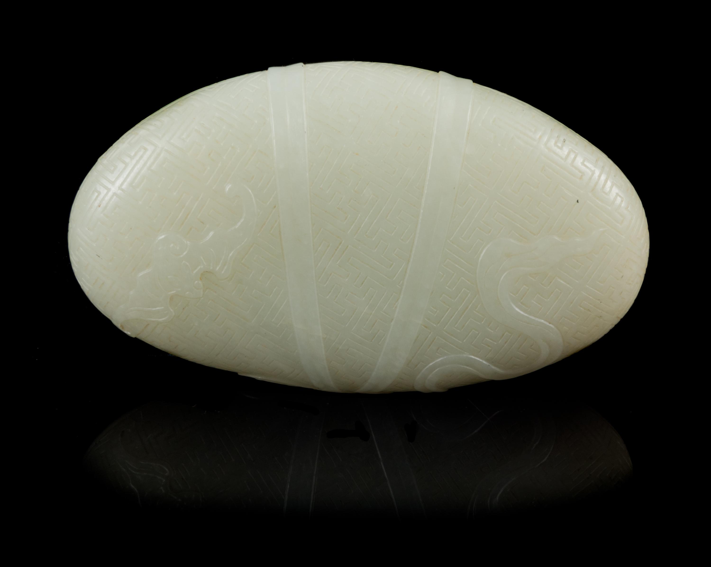 A Pale Celadon Jade Pebble Length 3 3/4 inches. — 18TH/19TH CENTURY