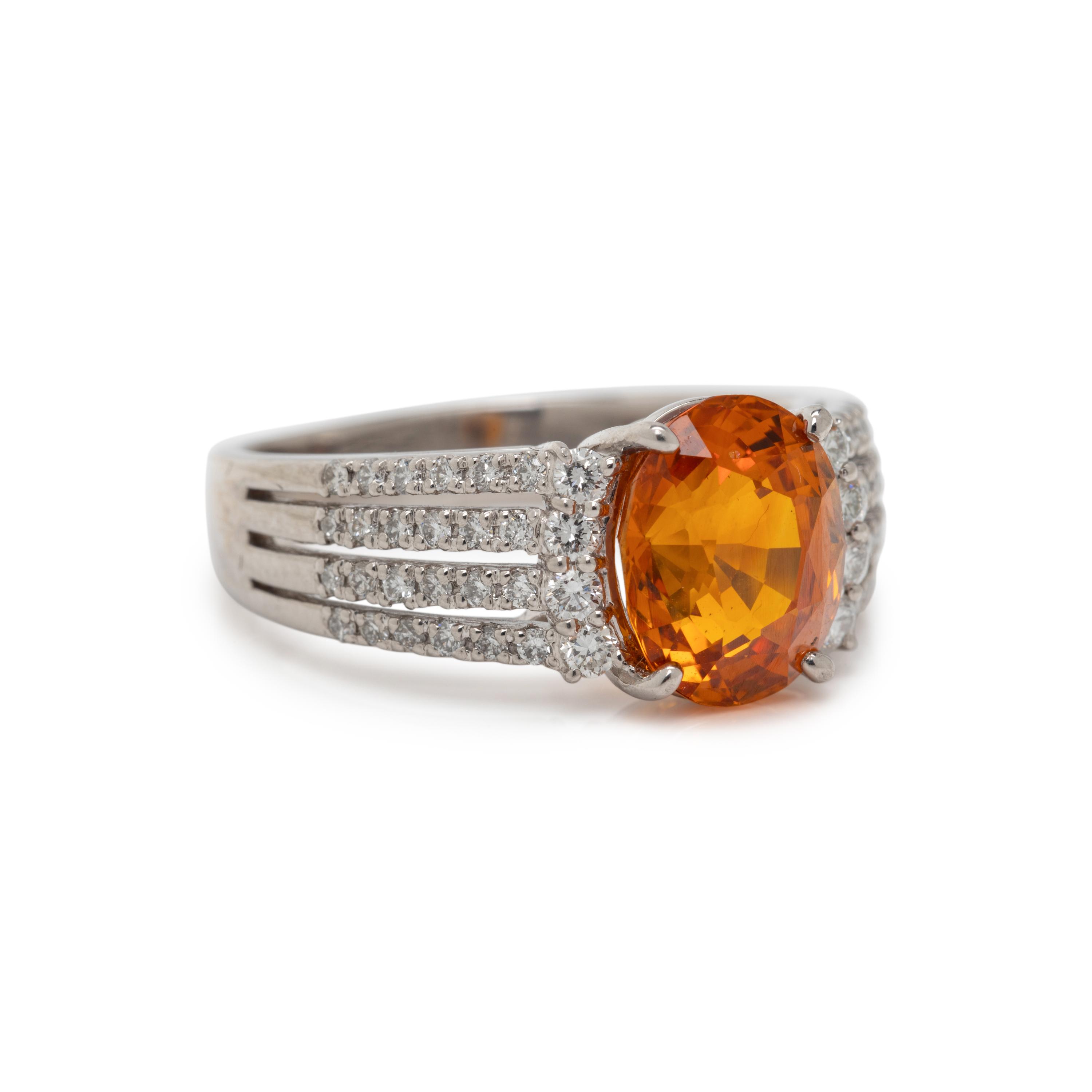ORANGE SAPPHIRE AND DIAMOND RING