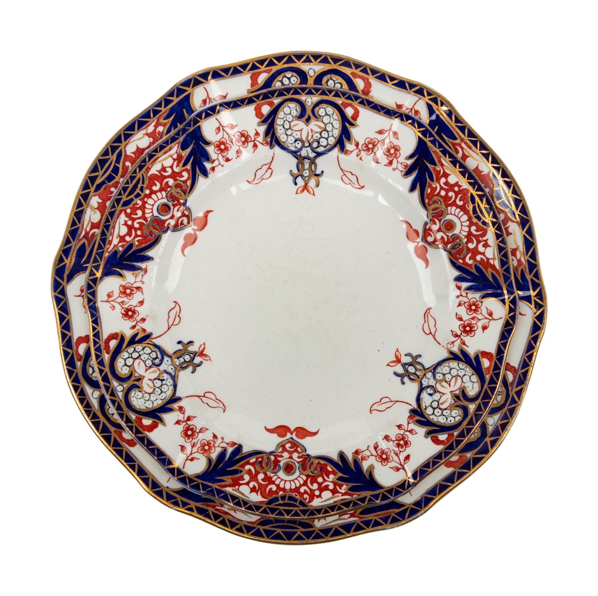 An Assembled Royal Crown Derby Porcelain Dinner Service