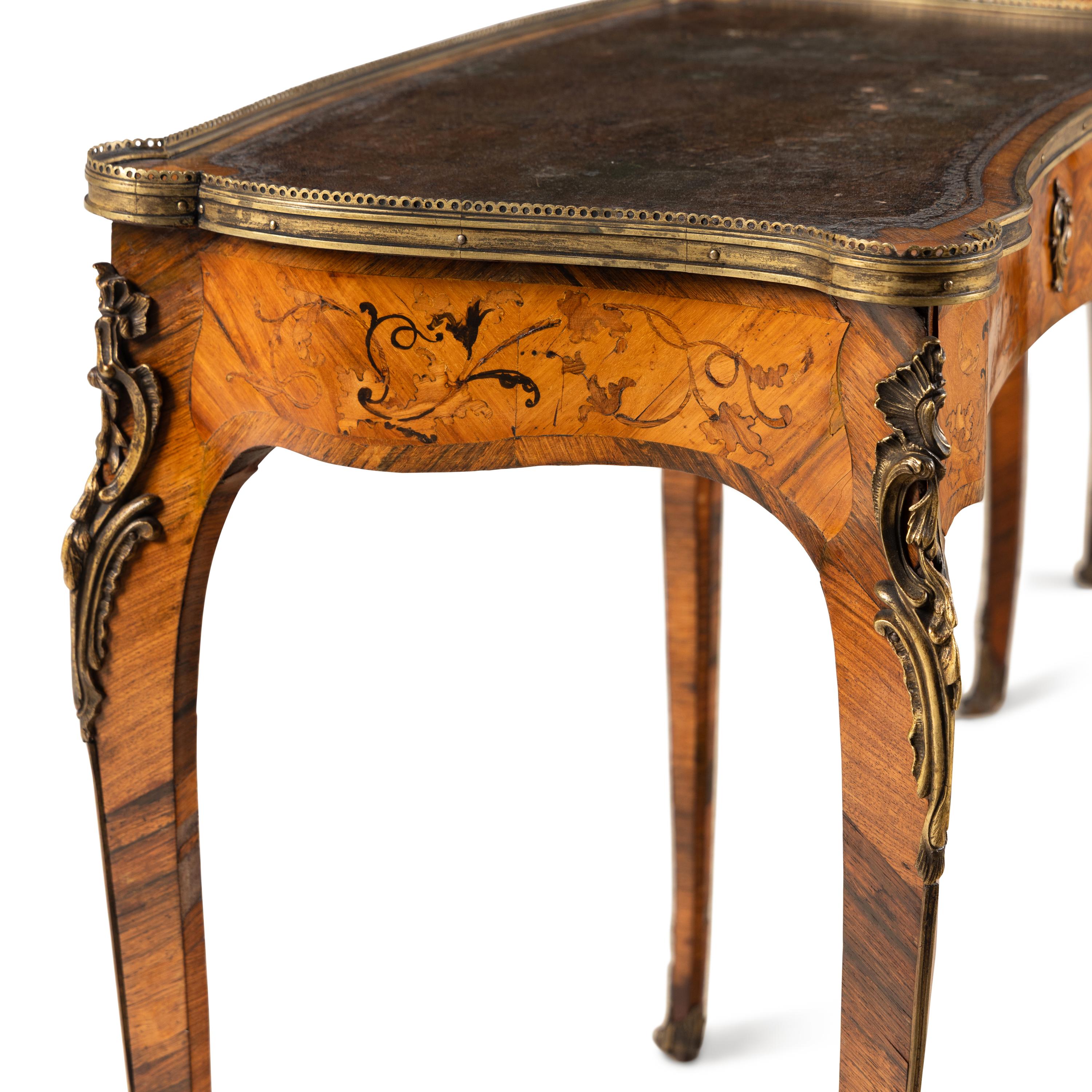 A Pair of Louis XV Style Gilt Bronze Mounted Marquetry Tables à Écrire