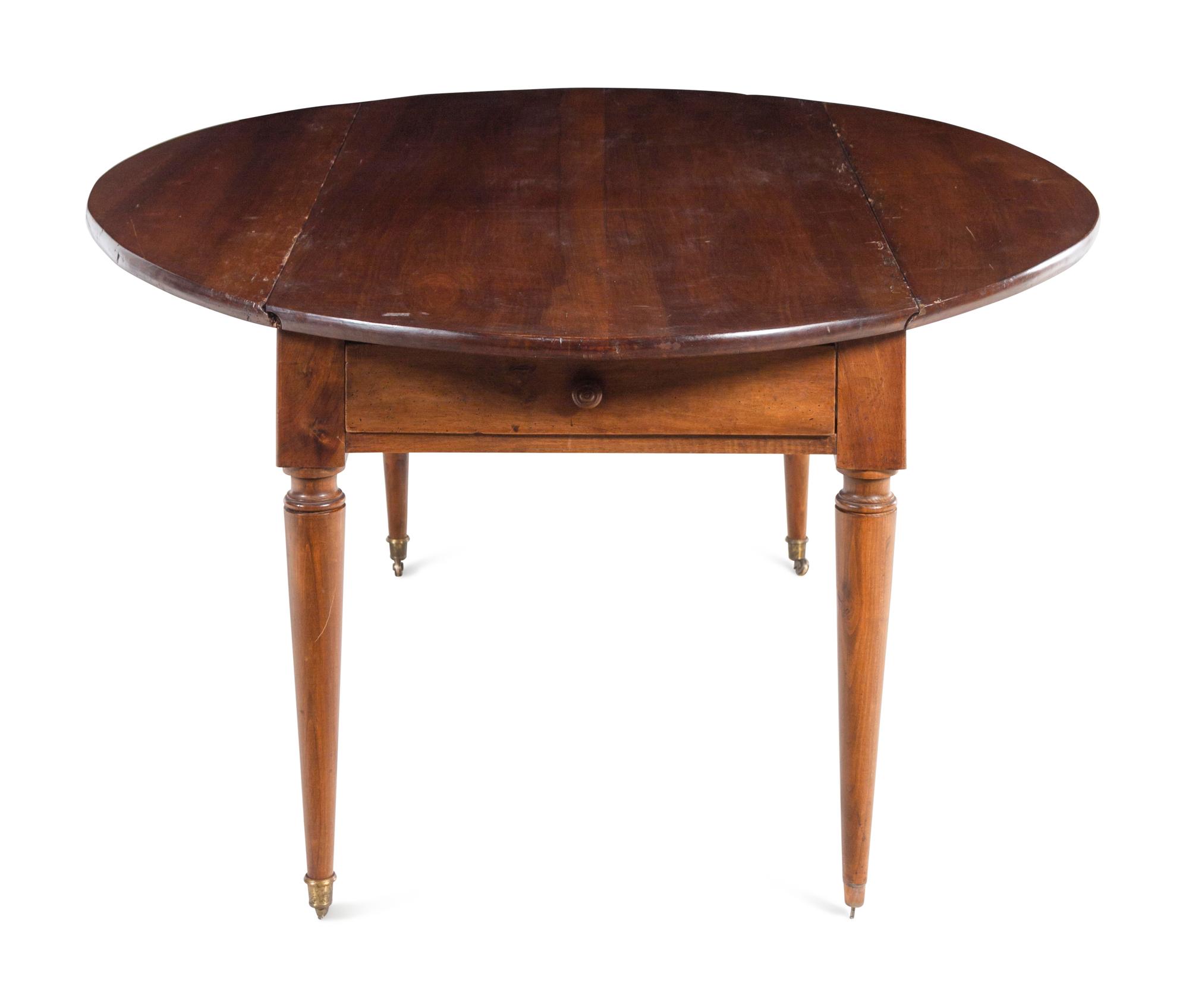 A Directoire Mahogany Drop-Leaf Dining Table