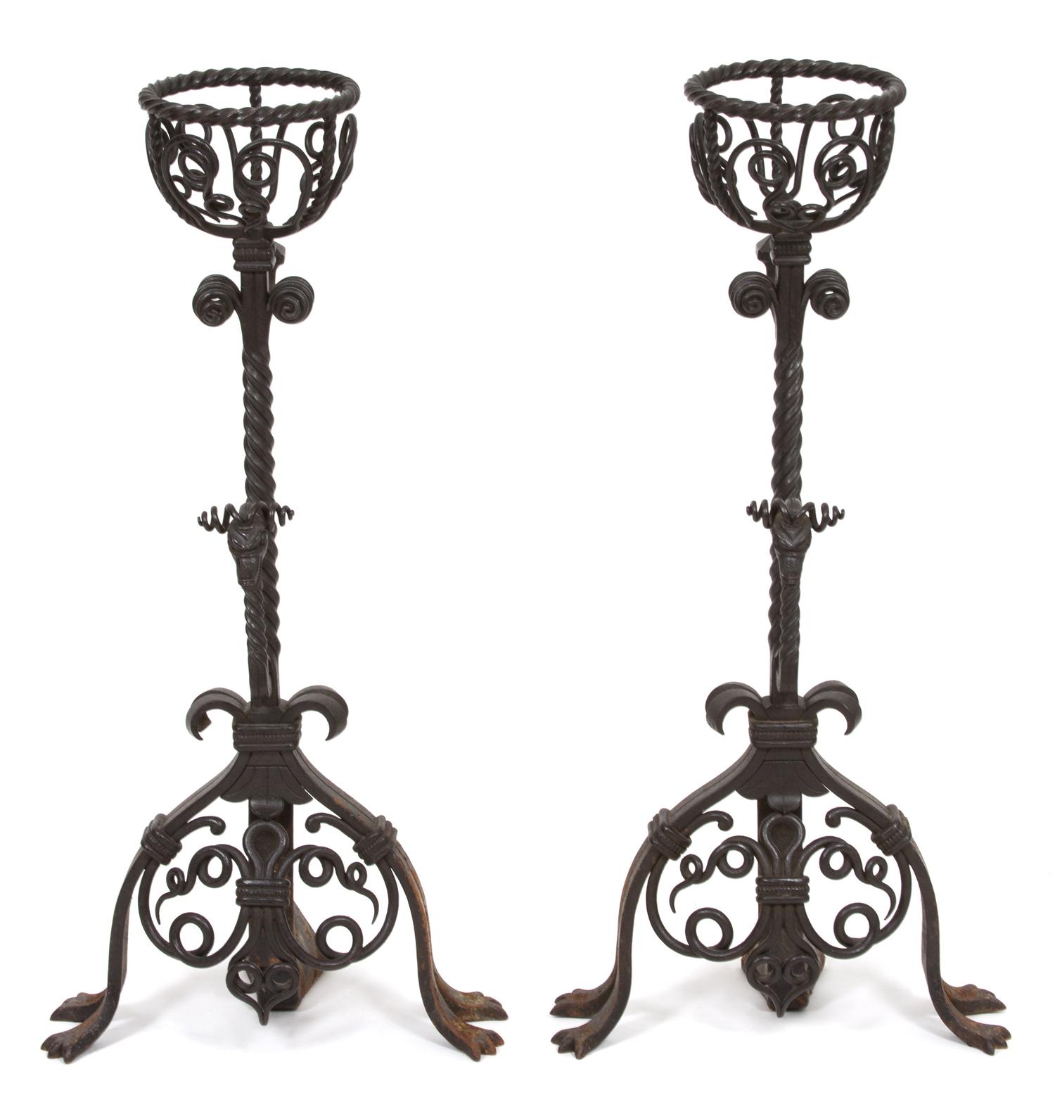 A Pair of Jacobean Style Wrought Iron Fire Dogs Height 29 1/2 inches. — 20TH CENTURY