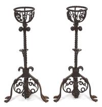 A Pair of Jacobean Style Wrought Iron Fire Dogs Height 29 1/2 inches. — 20TH CENTURY