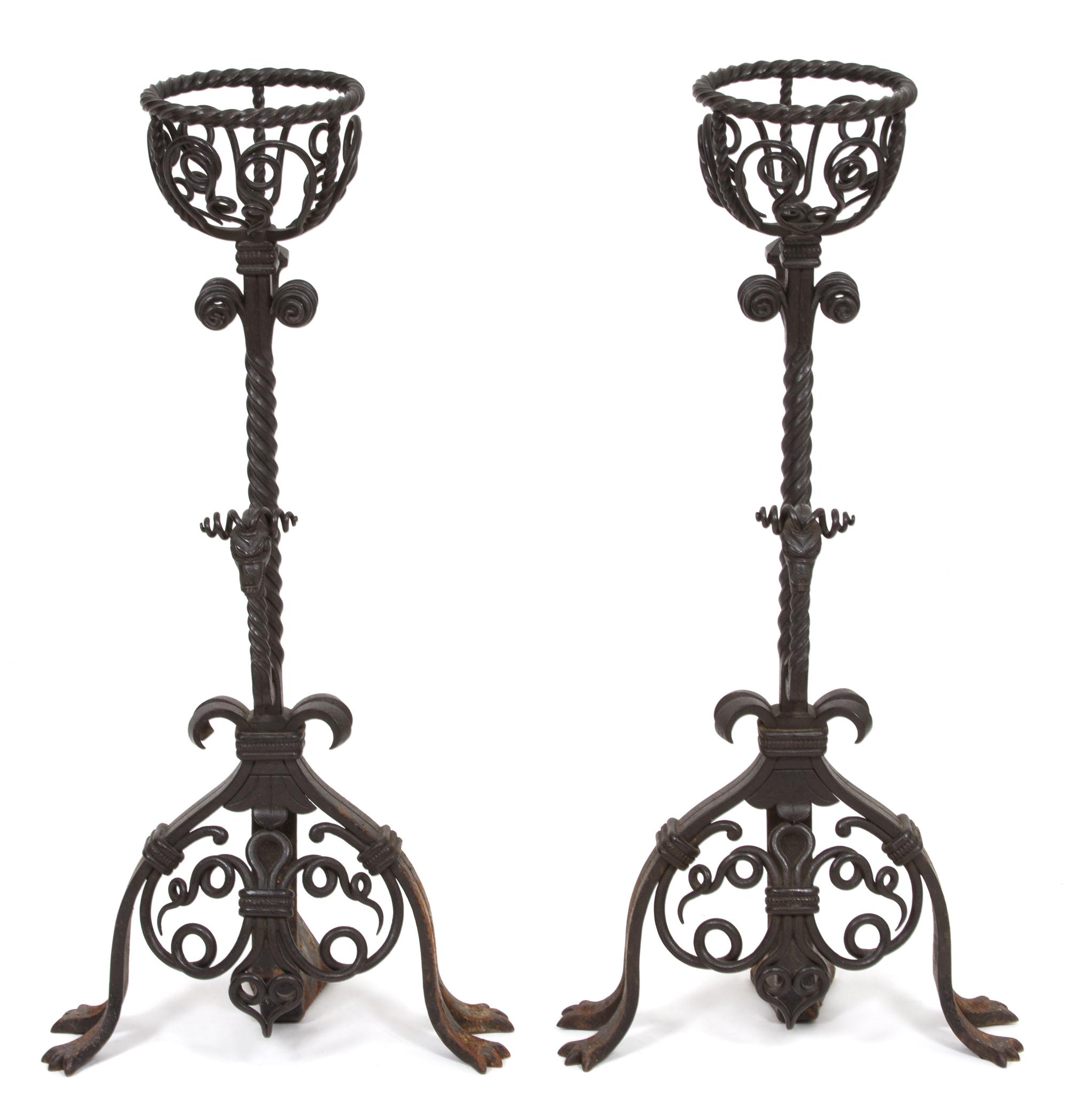 A Pair of Jacobean Style Wrought Iron Fire Dogs Height 29 1/2 inches. — 20TH CENTURY