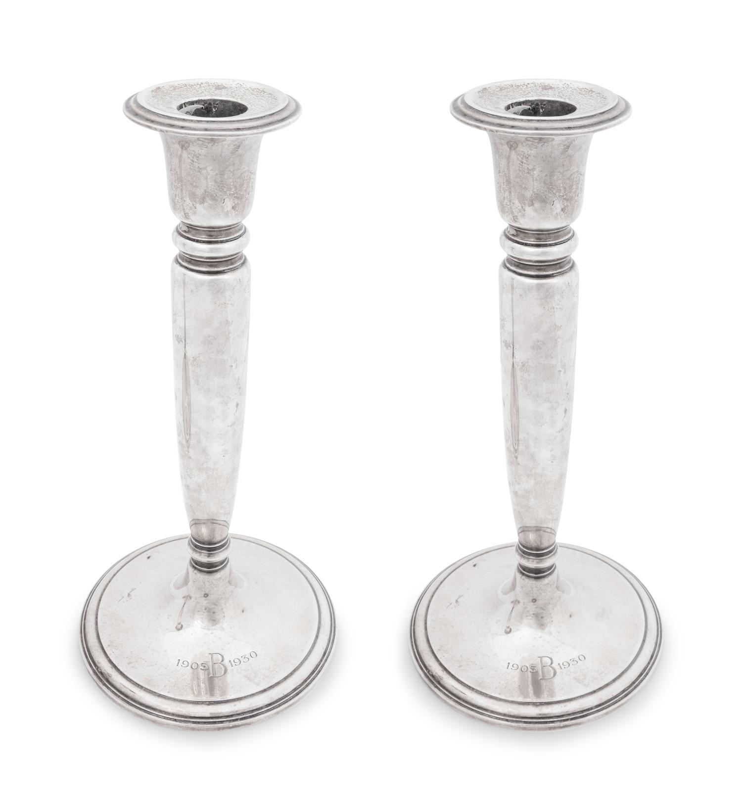 A Pair of Tiffany and Co Silver Candlesticks