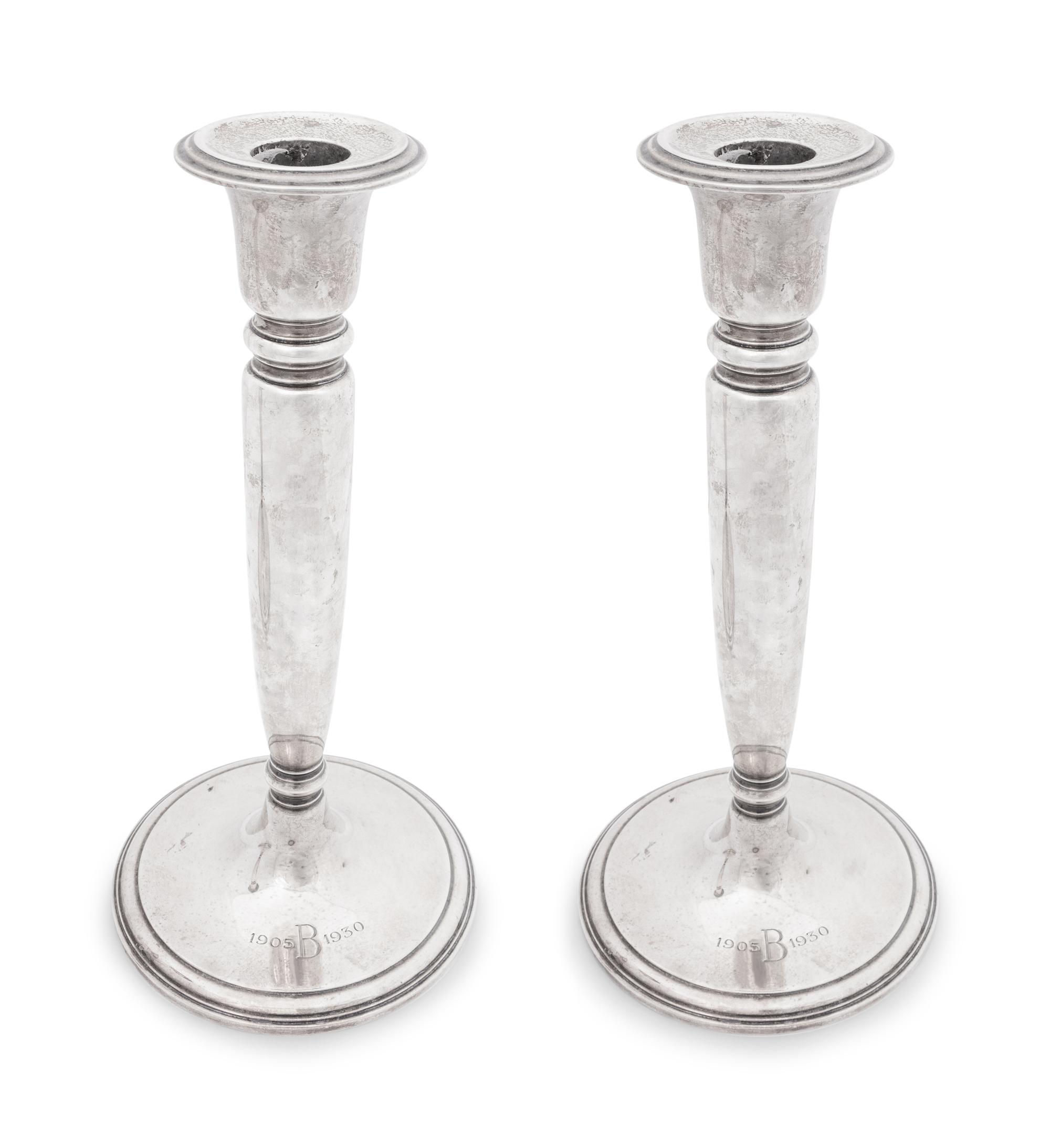 A Pair of Tiffany and Co Silver Candlesticks