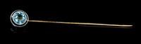 A Platinum, Yellow Gold and Aquamarine Stick Pin, 1.10 dwts.