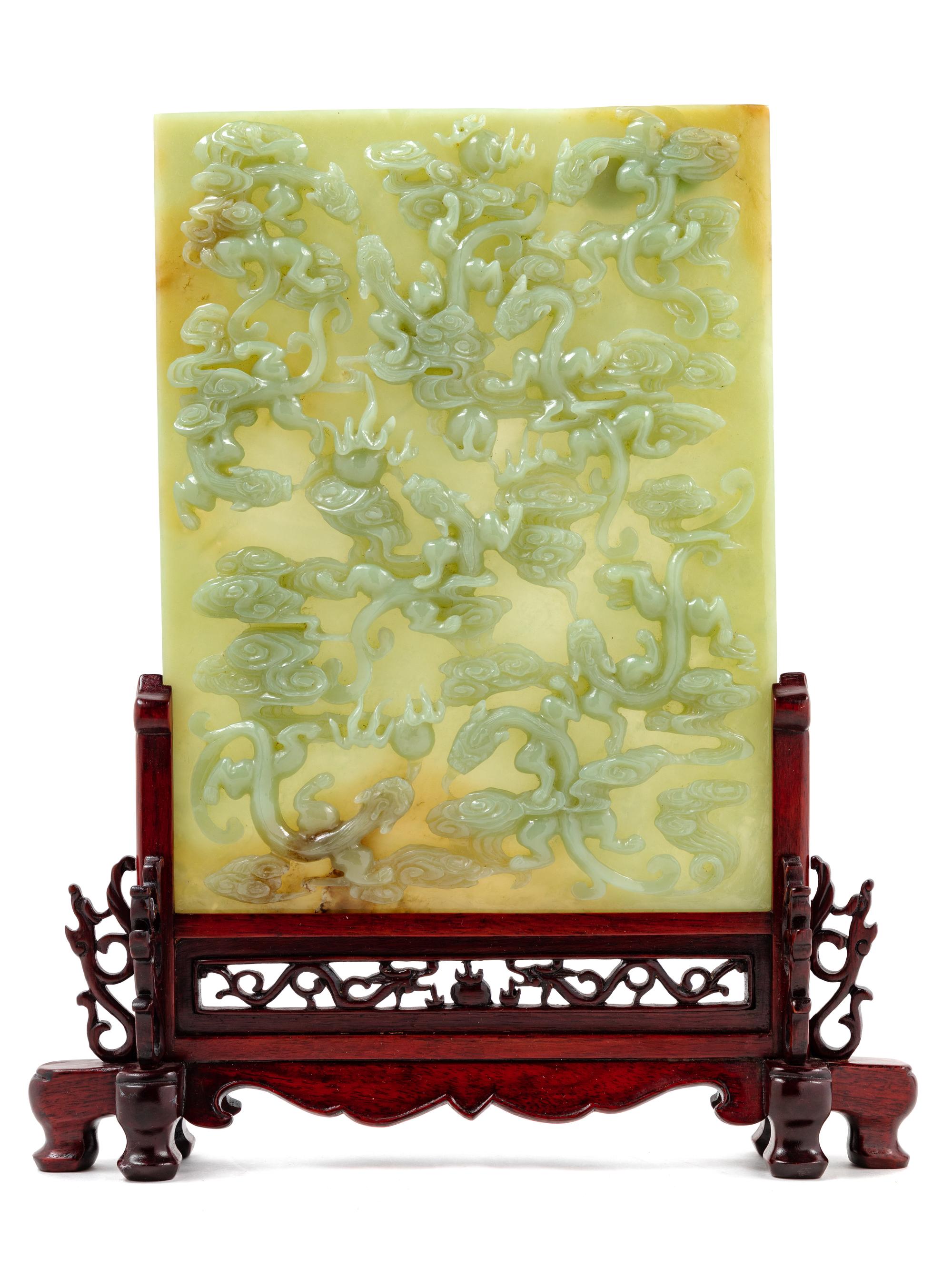 A Chinese Yellow Celadon Jade 'Chilong' Table Screen