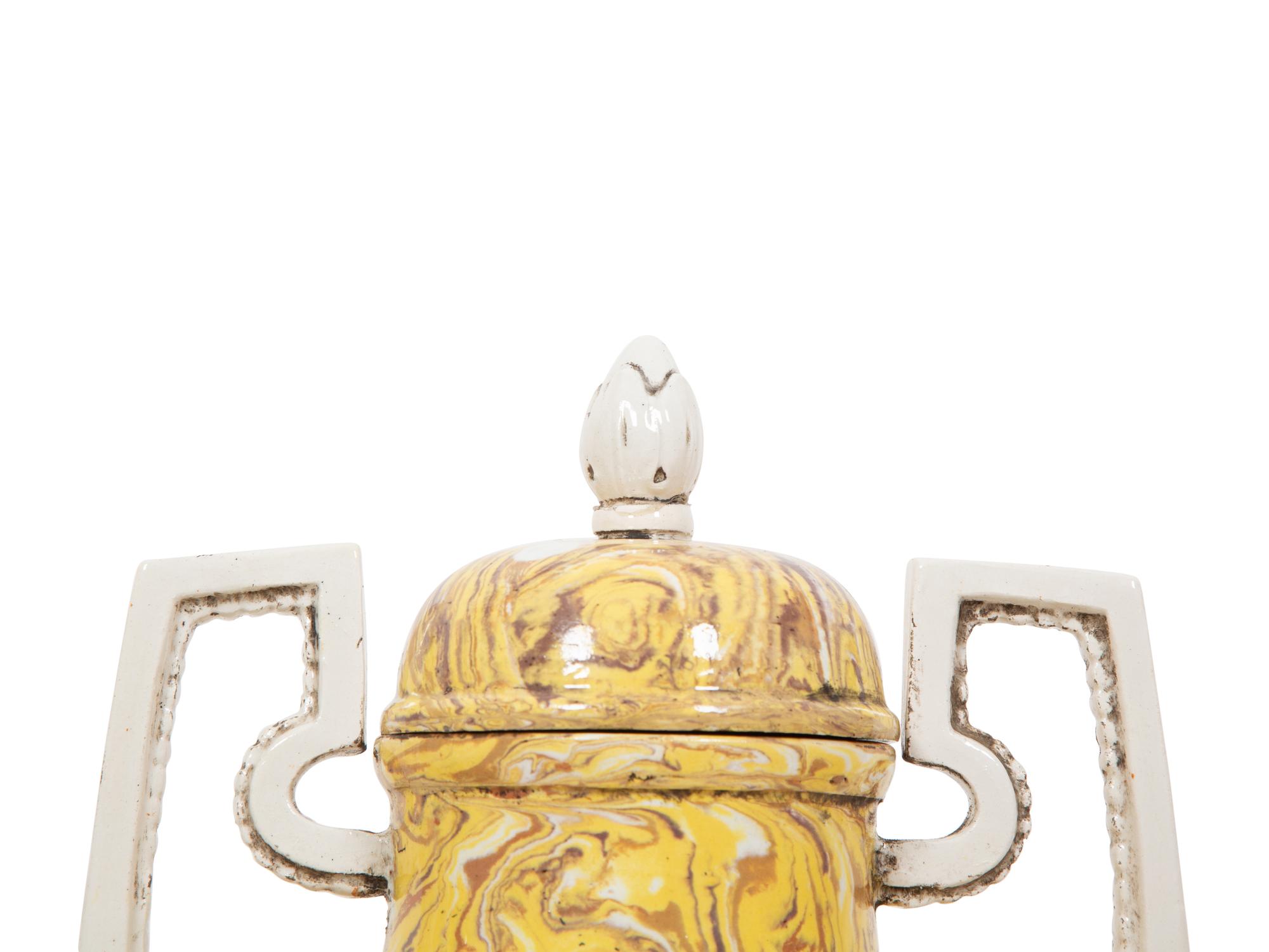 A Pair of Italian Glazed Ceramic Aptware Urns
