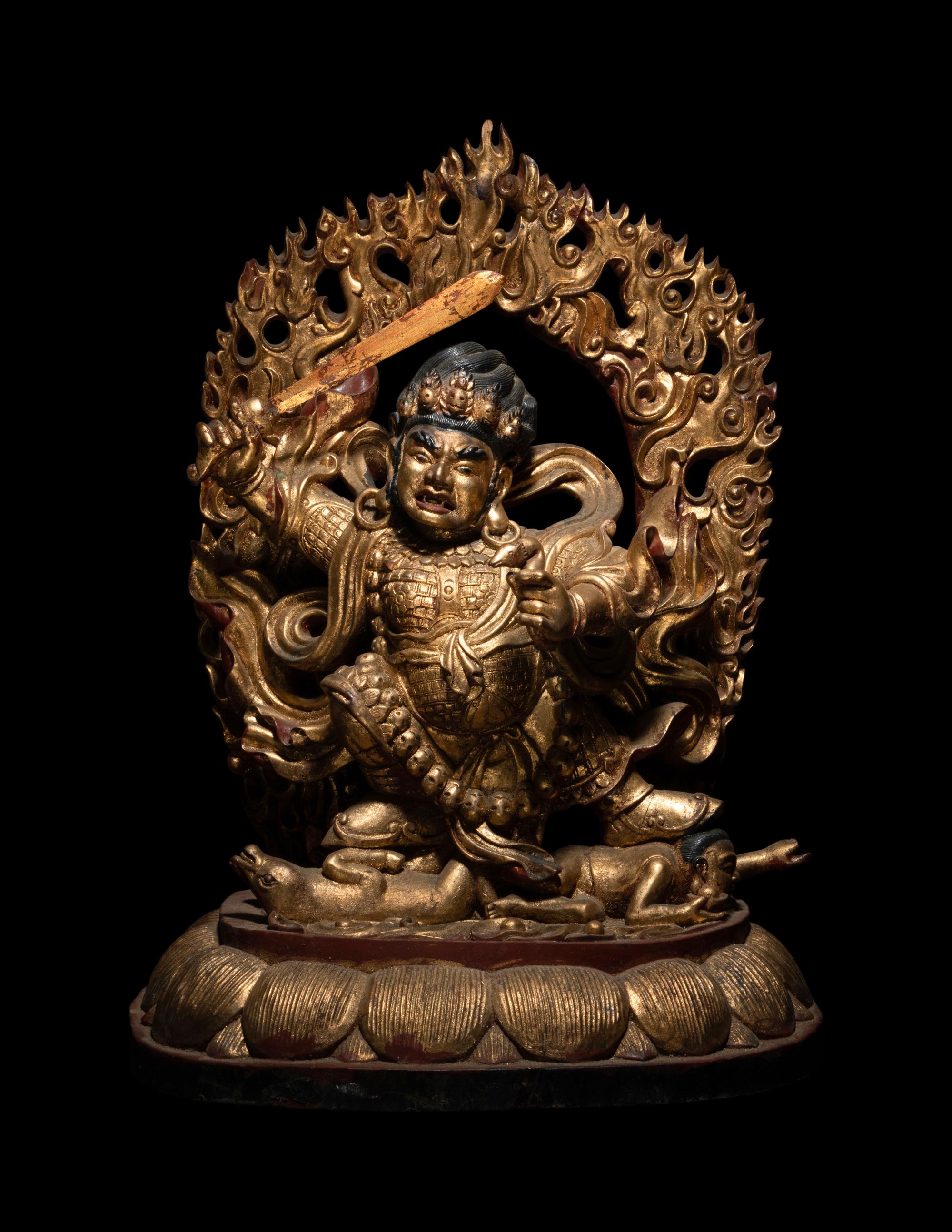 A Large Sino-Tibetan Gilt and Polychrome Lacquered Carved Wood Figure of a Dharmapala