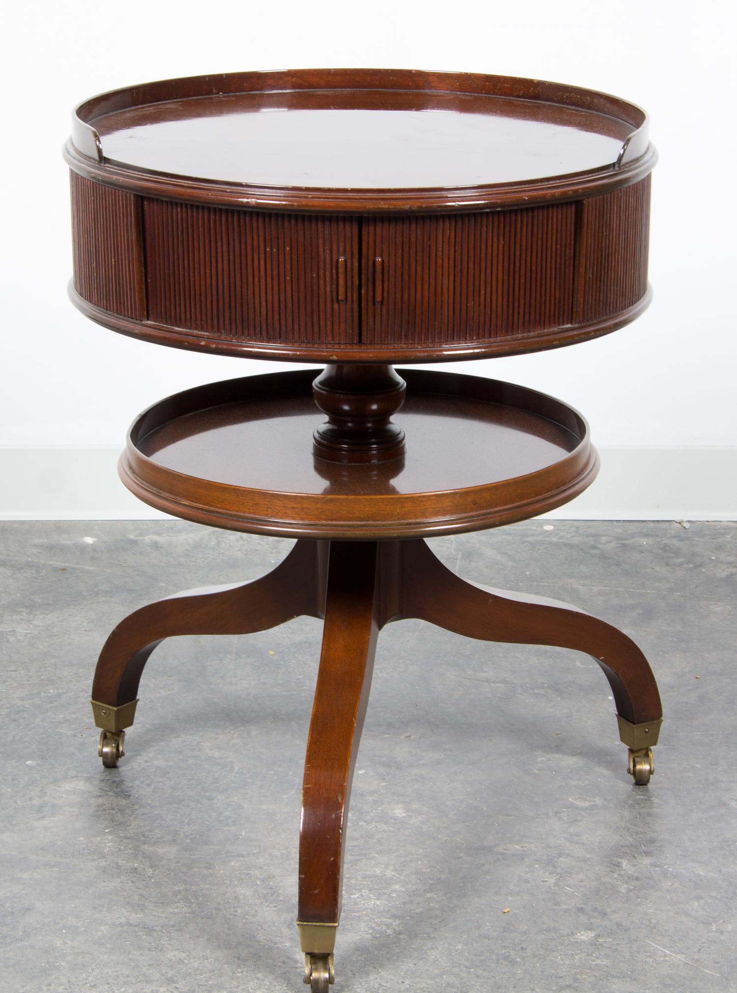 A Georgian Style Mahogany Drum Table Height 29 x diameter 21 3/4 inches. — 20TH CENTURY